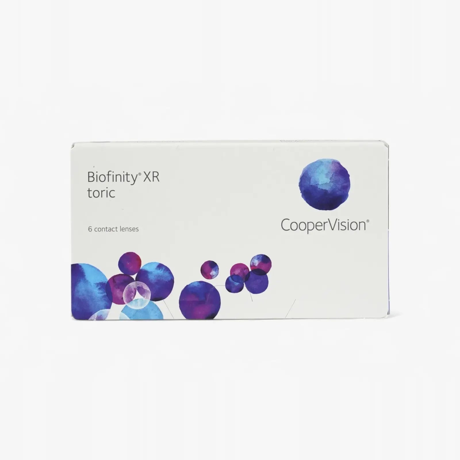 A box of Biofinity Toric XR - 6 Pk contact lenses, featuring Aquaform Technology and a white background with blue and purple circular designs, contains 6 lenses.