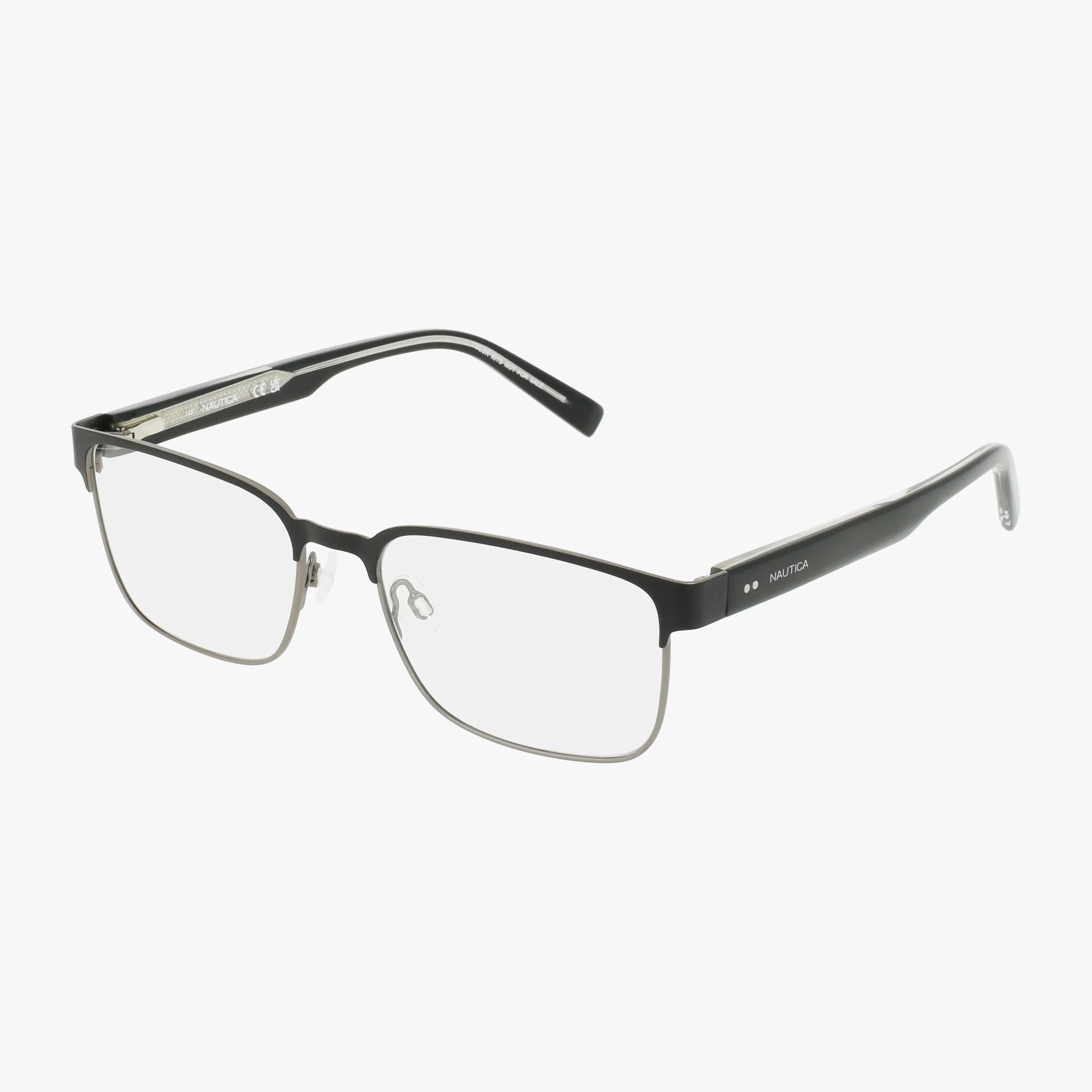 N7340 black and silver rectangular eyeglasses with thin metal frames and clear lenses, shown on a white background. Temples feature Nautica branding and a slight curve at the ends for a timeless look.