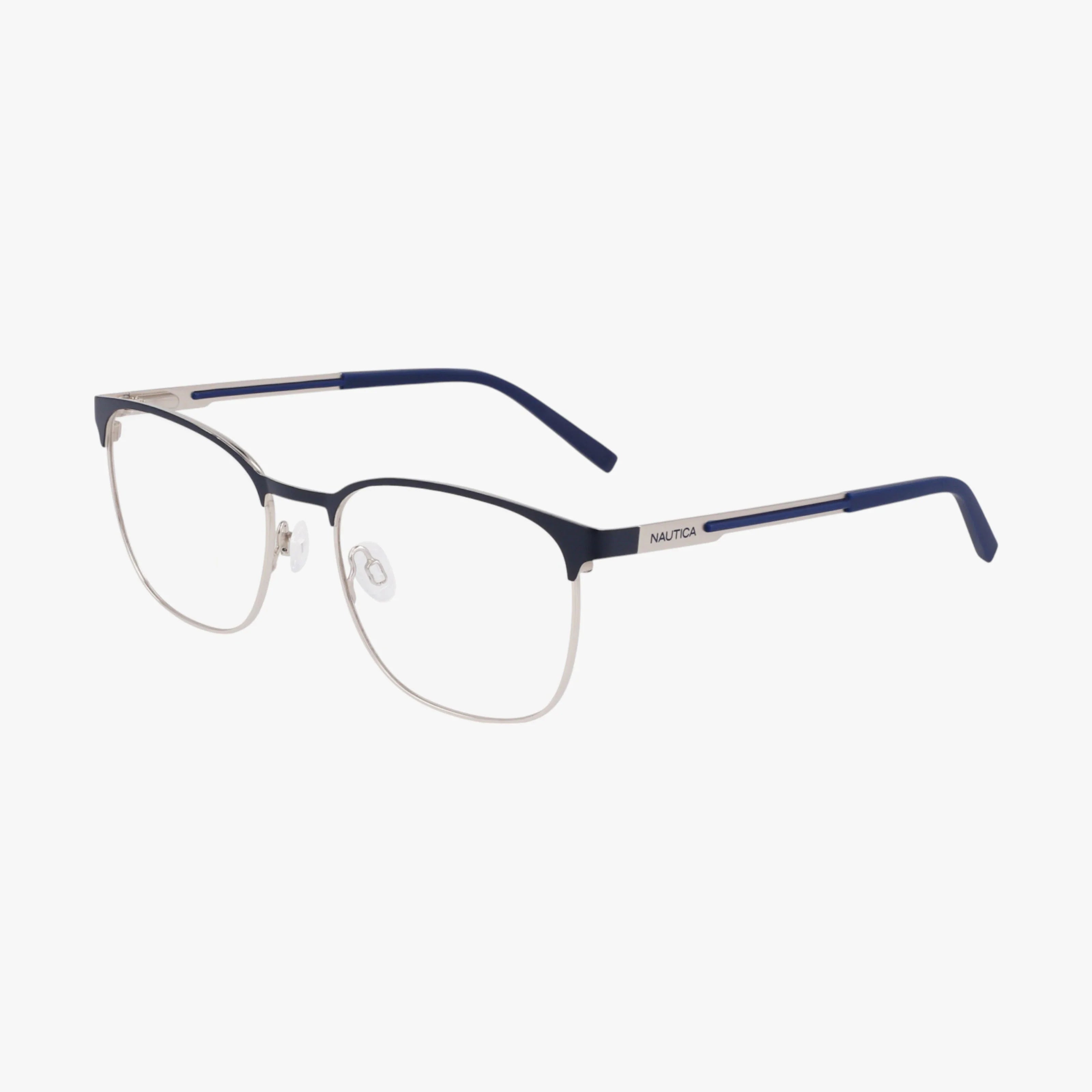 The Nautica N7343 eyeglasses feature thin, square silver rims, blue temples, and clear nose pads. The modern frame displays the Nautica name on the side against a plain white background.