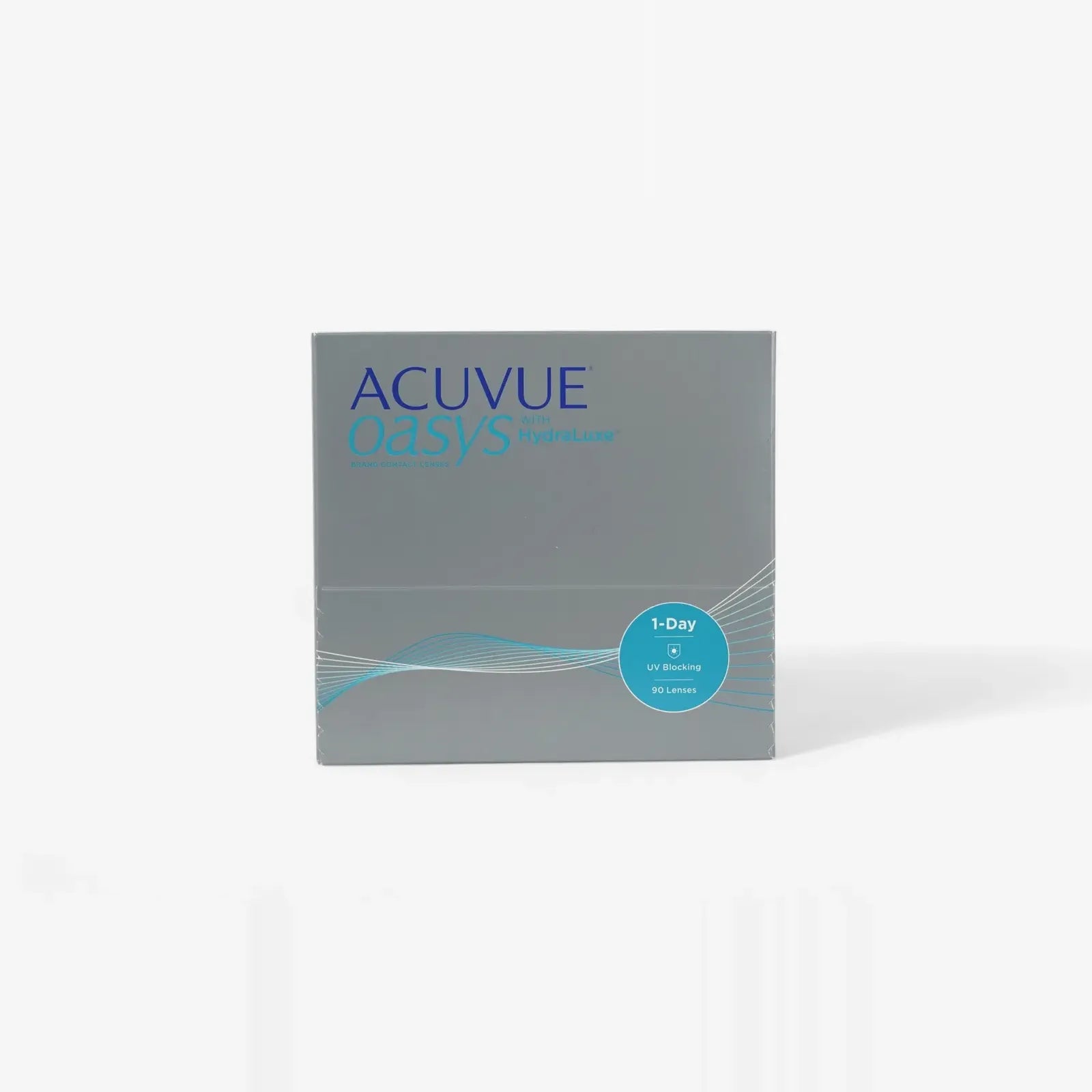 A grey box of Oasys 1 Day Sphere Hydraluxe 90Pk daily lenses with blue text, circular “90 lenses” label, subtle wave graphics, and HydraLuxe technology branding.