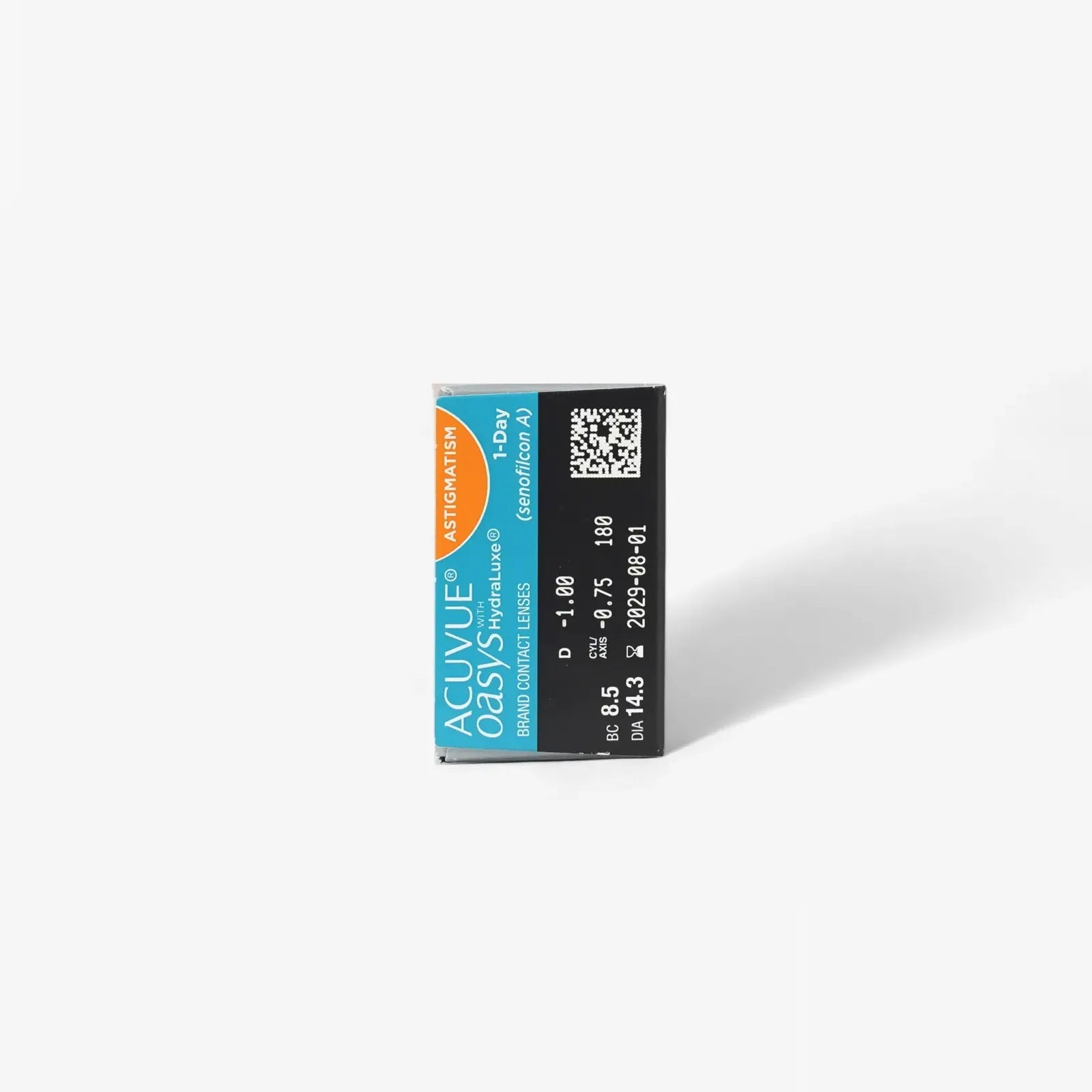 A box of Oasys 1Day Astig 30Pk Minus Power contacts with prescription details and a barcode on black and blue HydraLuxe packaging stands upright against a white background.