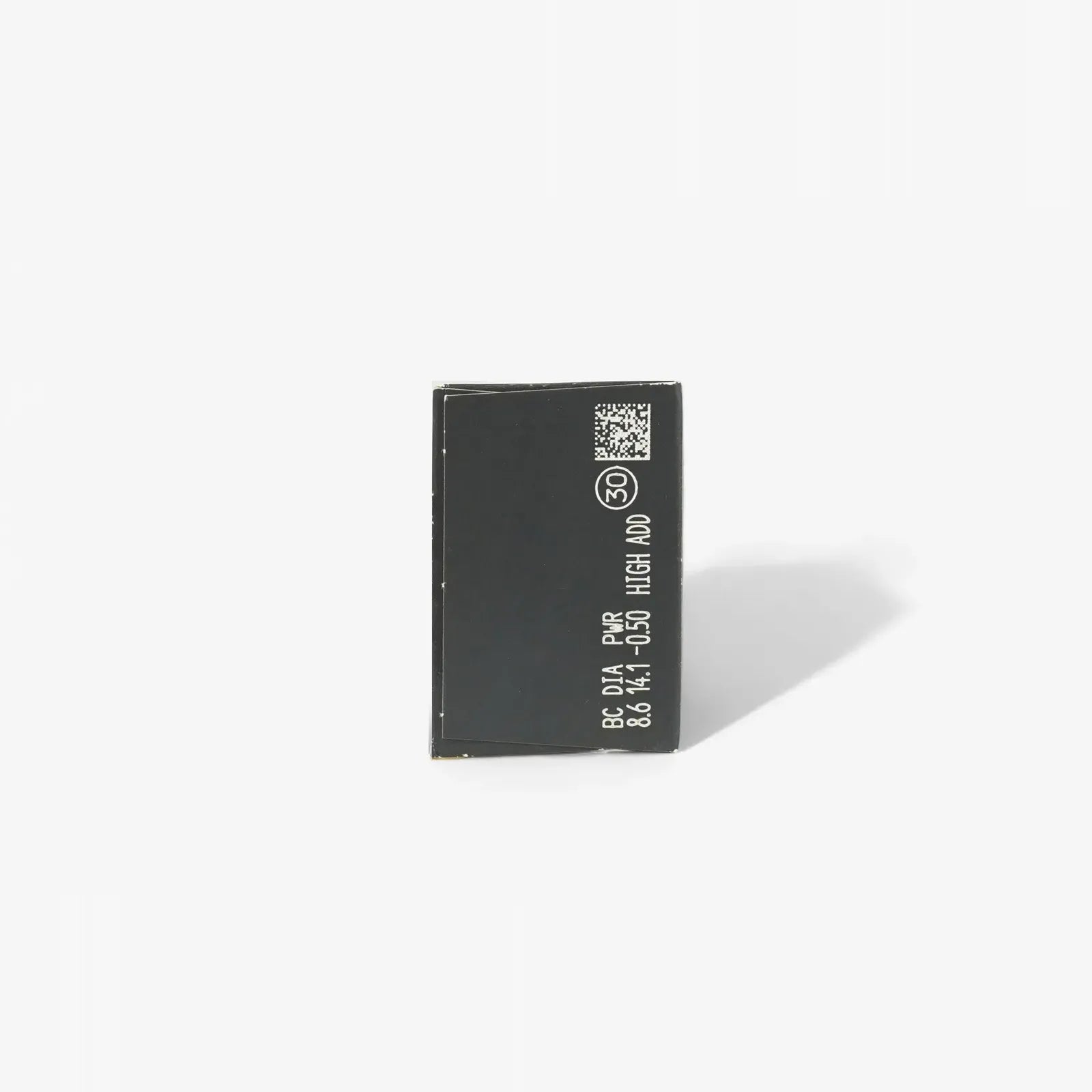 A rectangular black electronic chip with white text and a QR code stands upright against a plain white background, reminiscent of the sleek packaging of Clariti 1Day Multifocal 30-Pk lenses.
