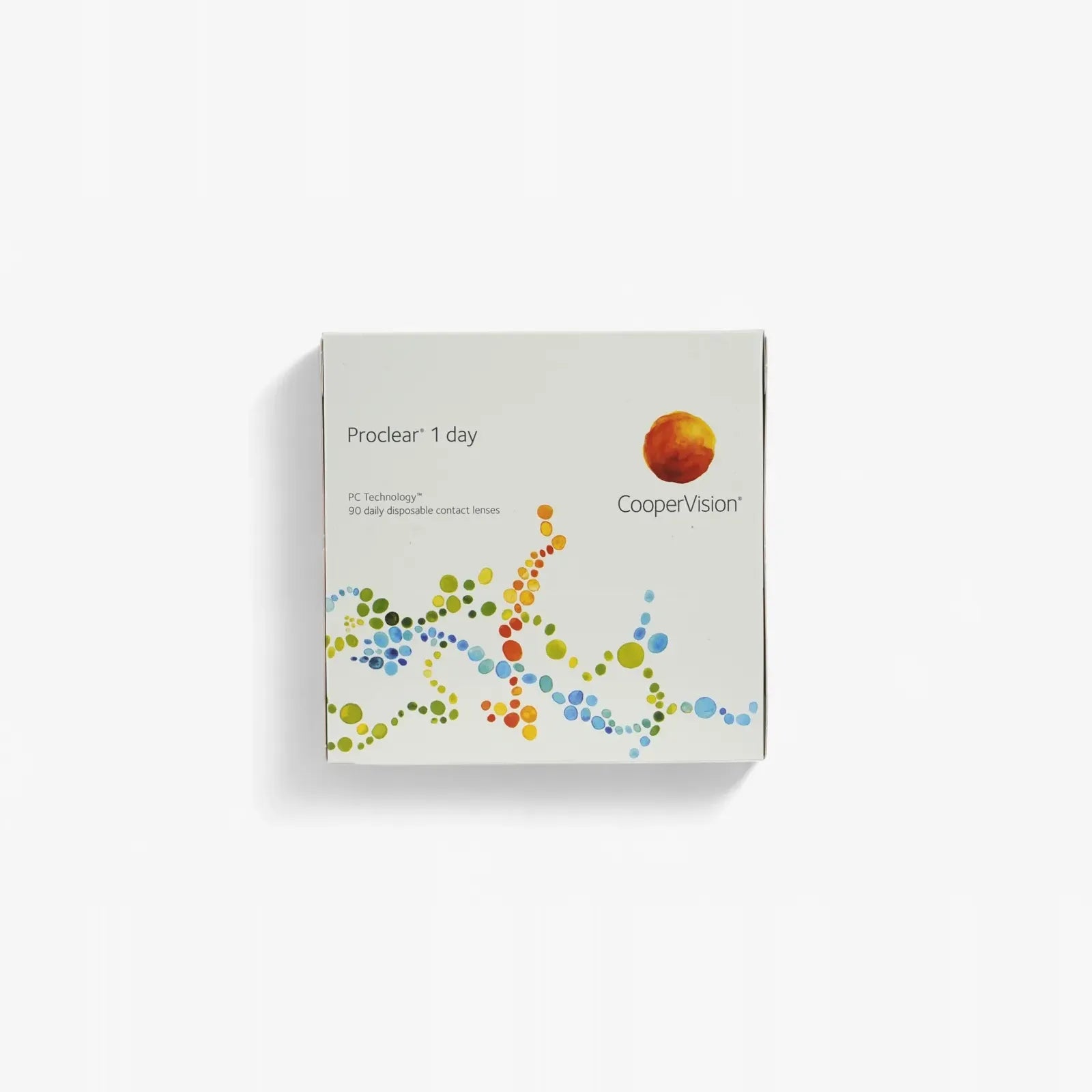 A white box of Proclear 1 Day - 90 Pack disposable contact lenses features colorful dotted lines and the orange CooperVision logo on the front, designed for exceptional comfort throughout the day.
