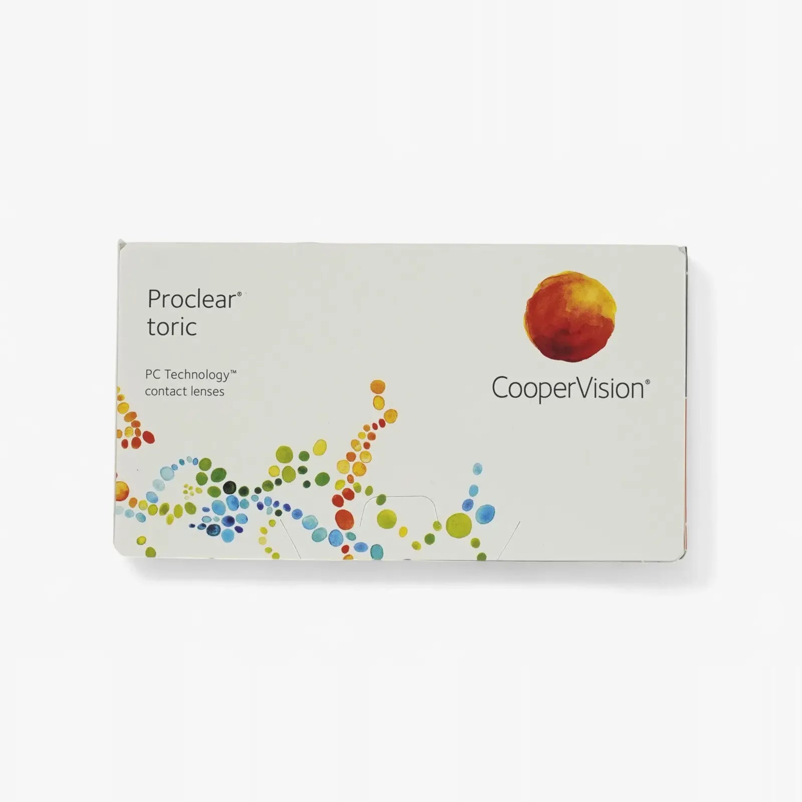 A white box of Proclear Toric - 6 Pk lenses for astigmatism, decorated with colorful dotted wave designs and an orange circular logo in the upper right.