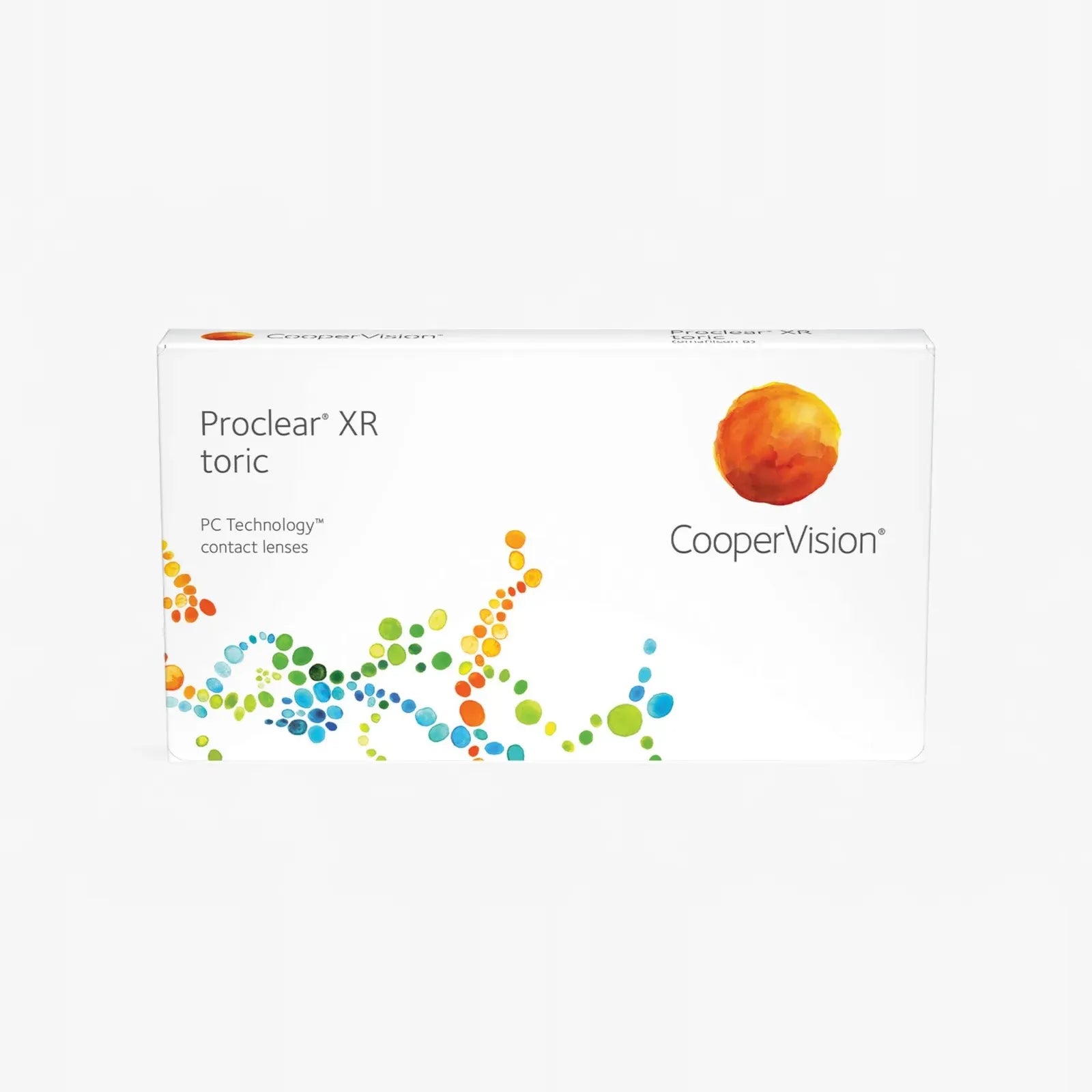 A white box of Proclear Toric XR - 6 Pack contact lenses with colorful dotted patterns and an orange circle in the top right—designed to provide comfort for those with dry eyes.