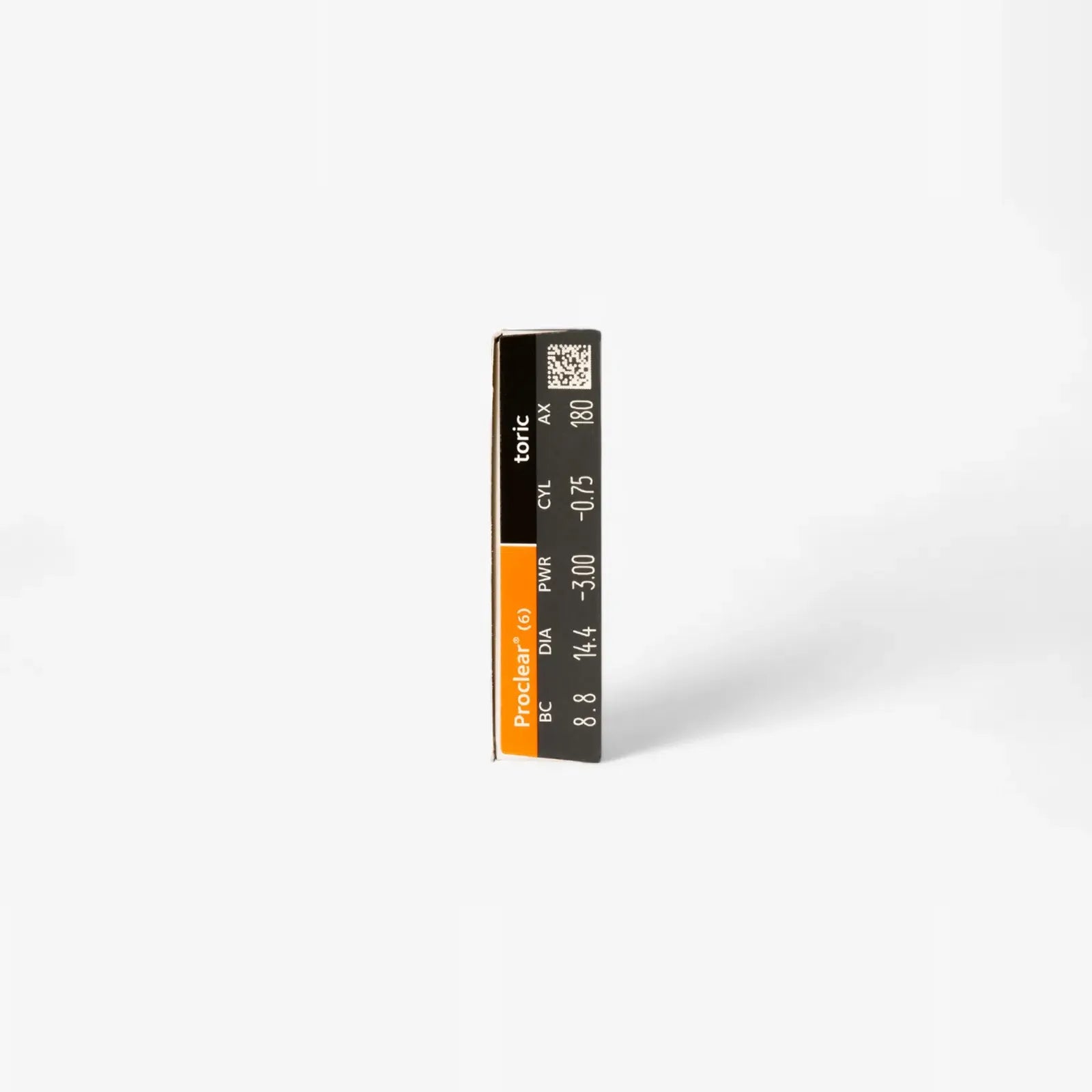 A black and orange Proclear Toric XR - 6 Pack contact lens box stands upright on a white background, showing specifications like power, cylinder, axis, and base curve—suitable for those with dry eyes.