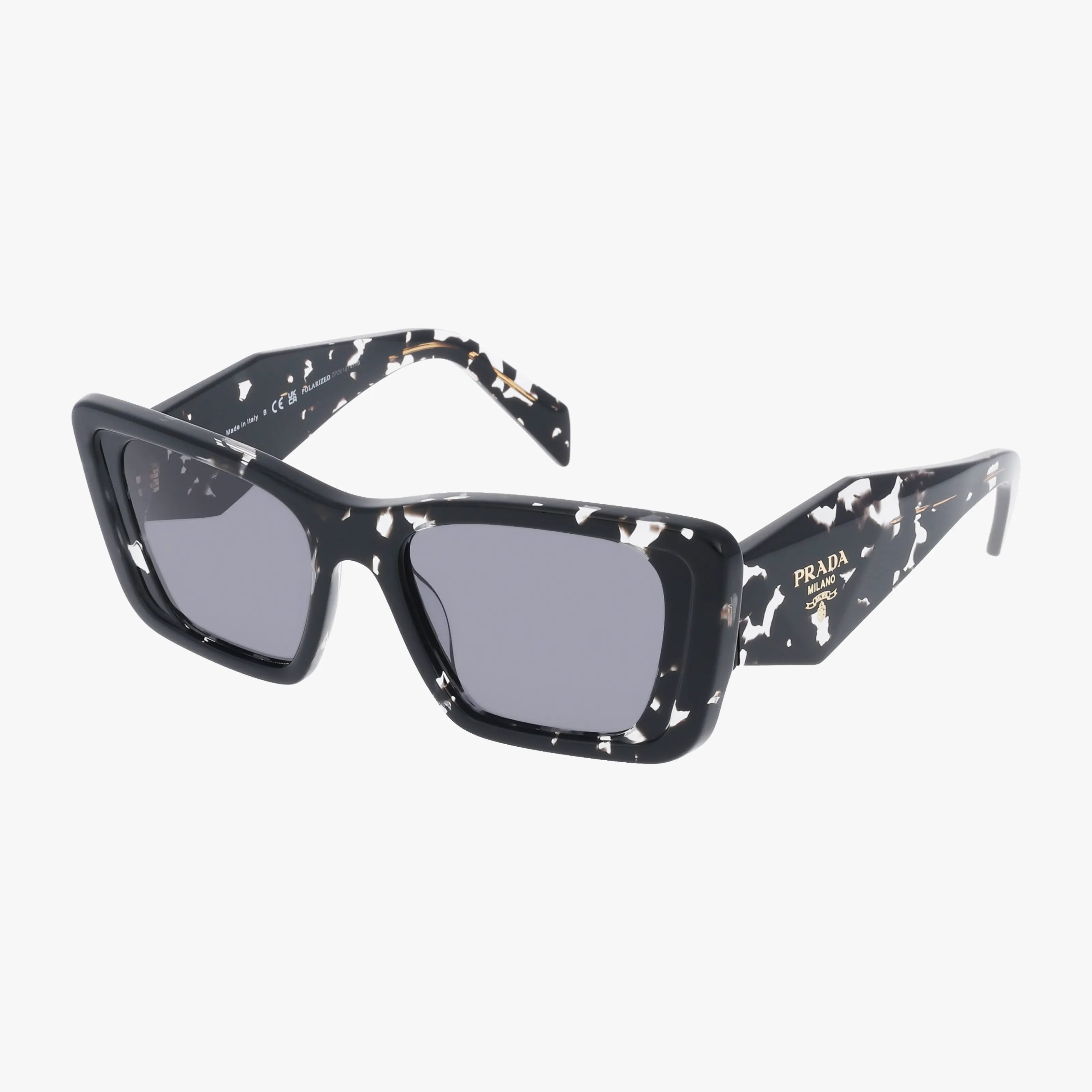 PR08YS Black Prada sunglasses with rectangular frames, a white speckled pattern, and dark lenses. The Prada logo shines in gold on the temple. Photographed on a plain white background for easy online shopping.