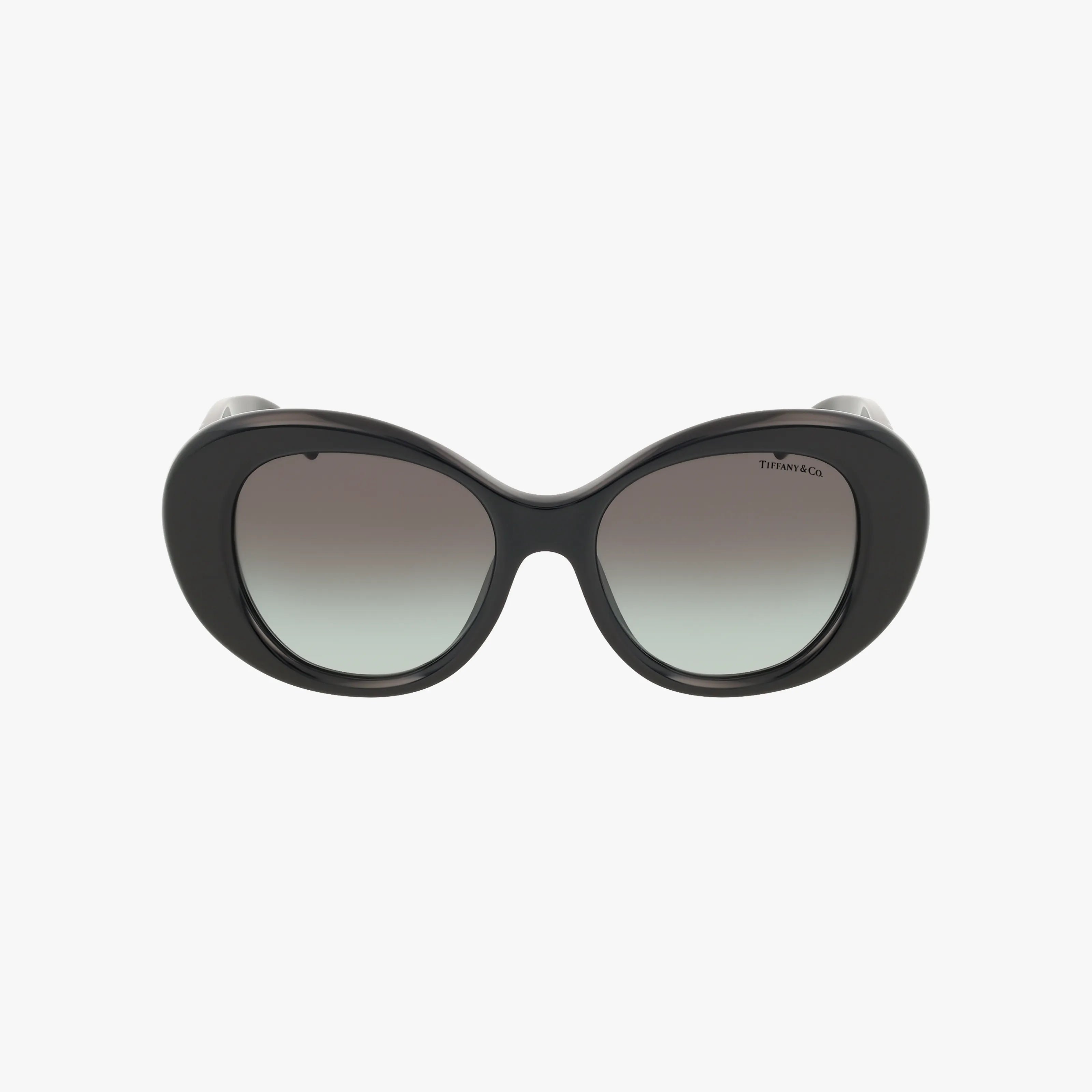 Front view of black oval-shaped Tiffany & Co. TF4228 sunglasses with dark gradient lenses and visible logo on the upper right lens, set against a plain white background. Shop these stylish sunglasses online for advanced protection.