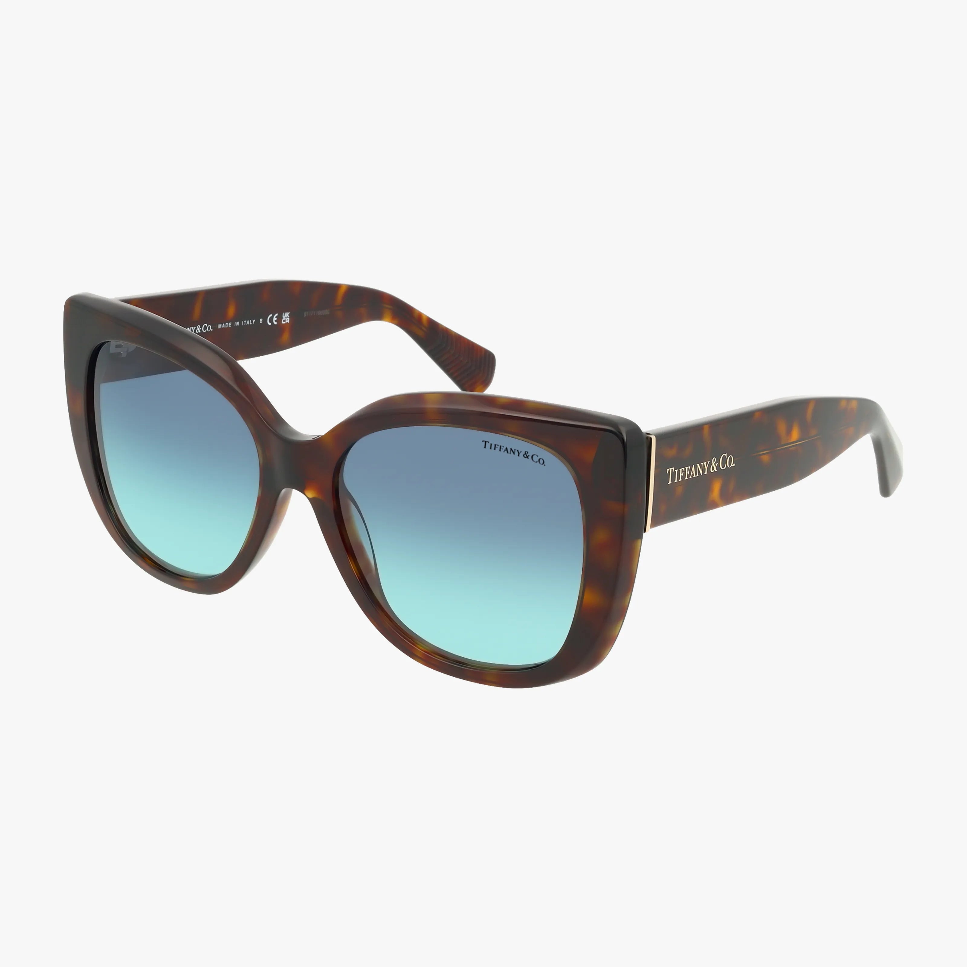 The TF4229 tortoiseshell oversized sunglasses feature premium blue gradient lenses for superior sun protection and Tiffany & Co. branding on the temple, shown against a white background.