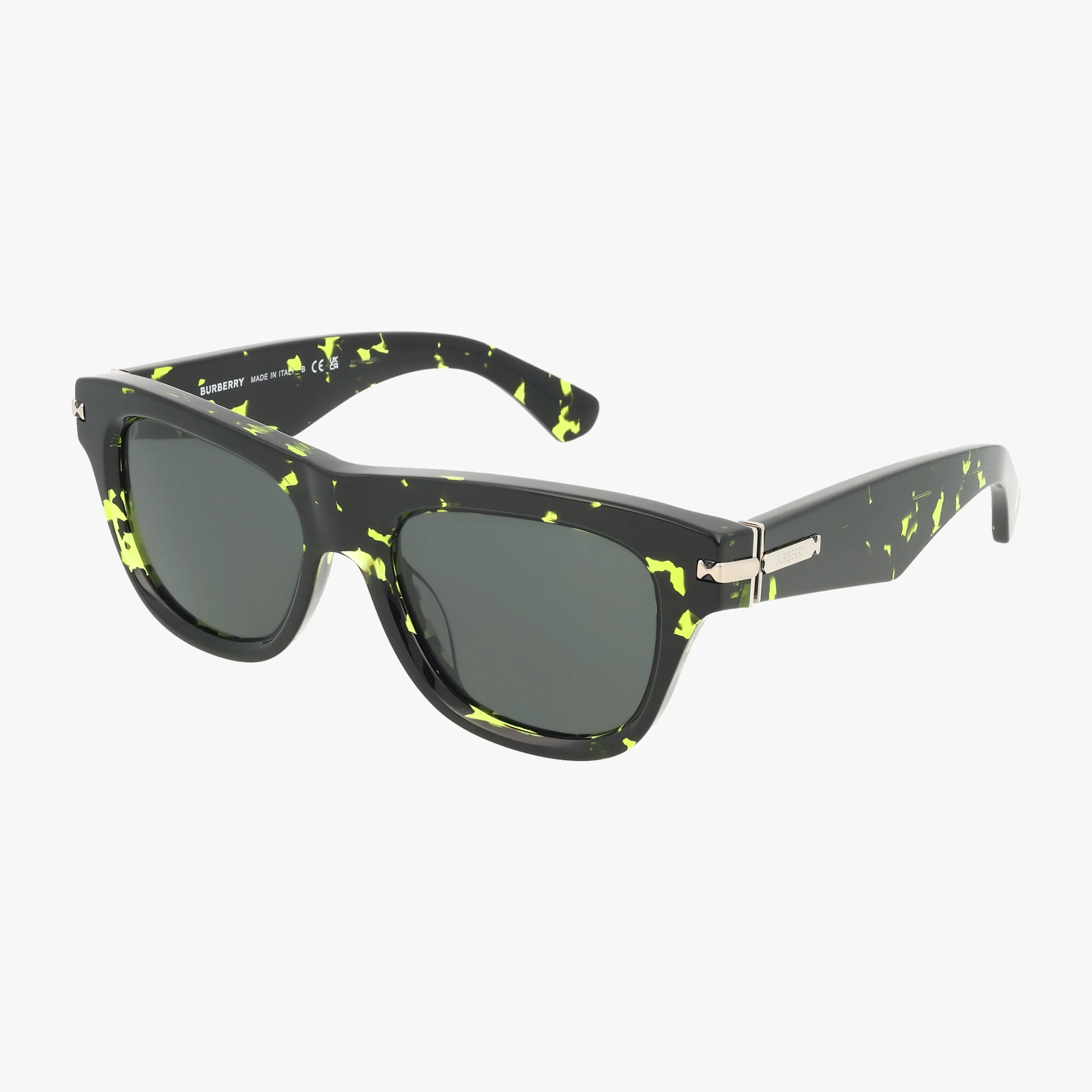 The BE4438U sunglasses feature black rectangular frames with neon yellow splatter patterns and silver hinge accents, perfect for outdoor adventures. Shop these bold glasses online, showcased on a crisp white background.