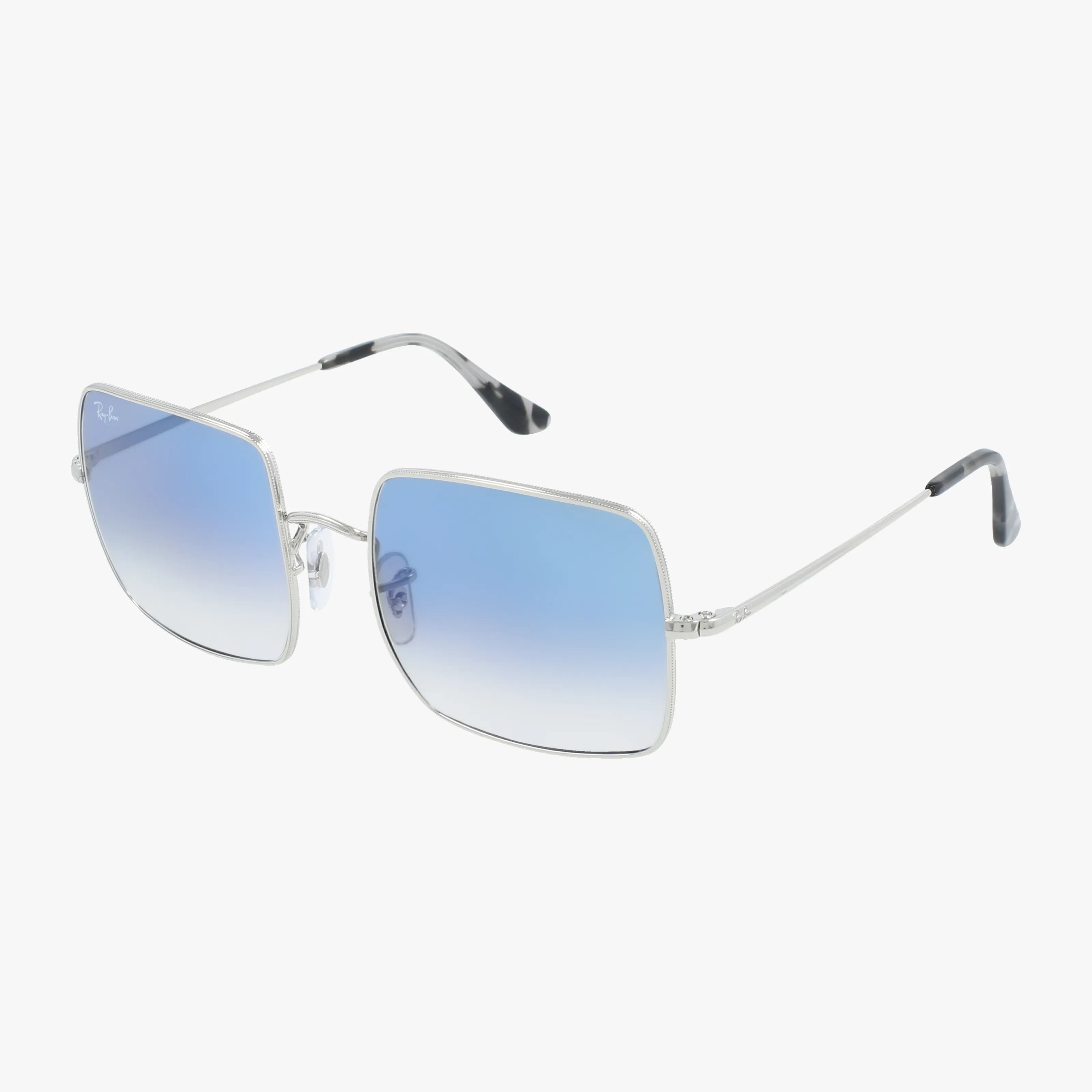 The RB1971 SQUARE sunglasses feature a chic square design with thin silver frames and blue gradient lenses, showcased at an angle on a white background.