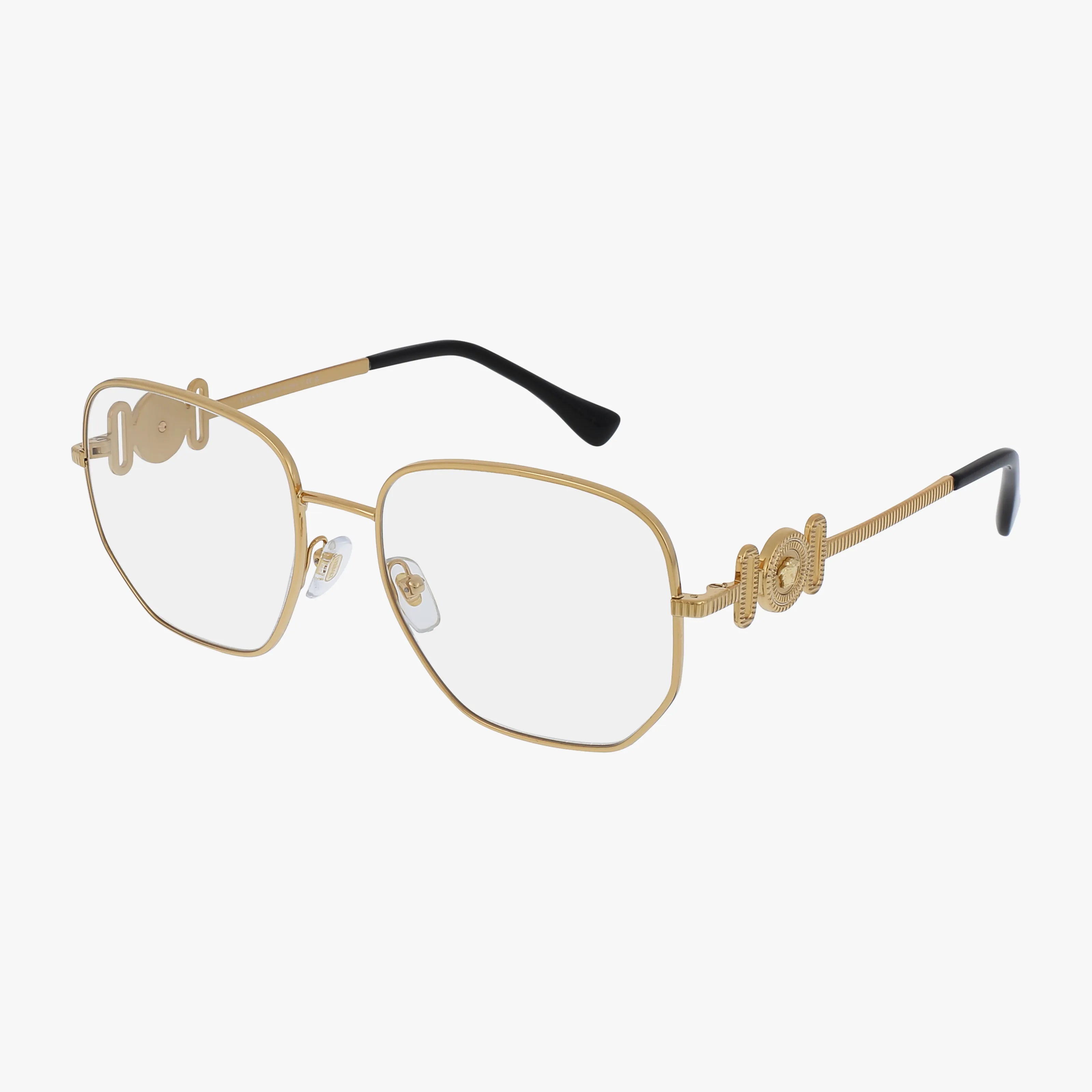 The VE1283 eyeglasses feature a contemporary gold metal geometric square frame, clear lenses, black temple tips, and coiled detailing on the arms, displayed on a white background.