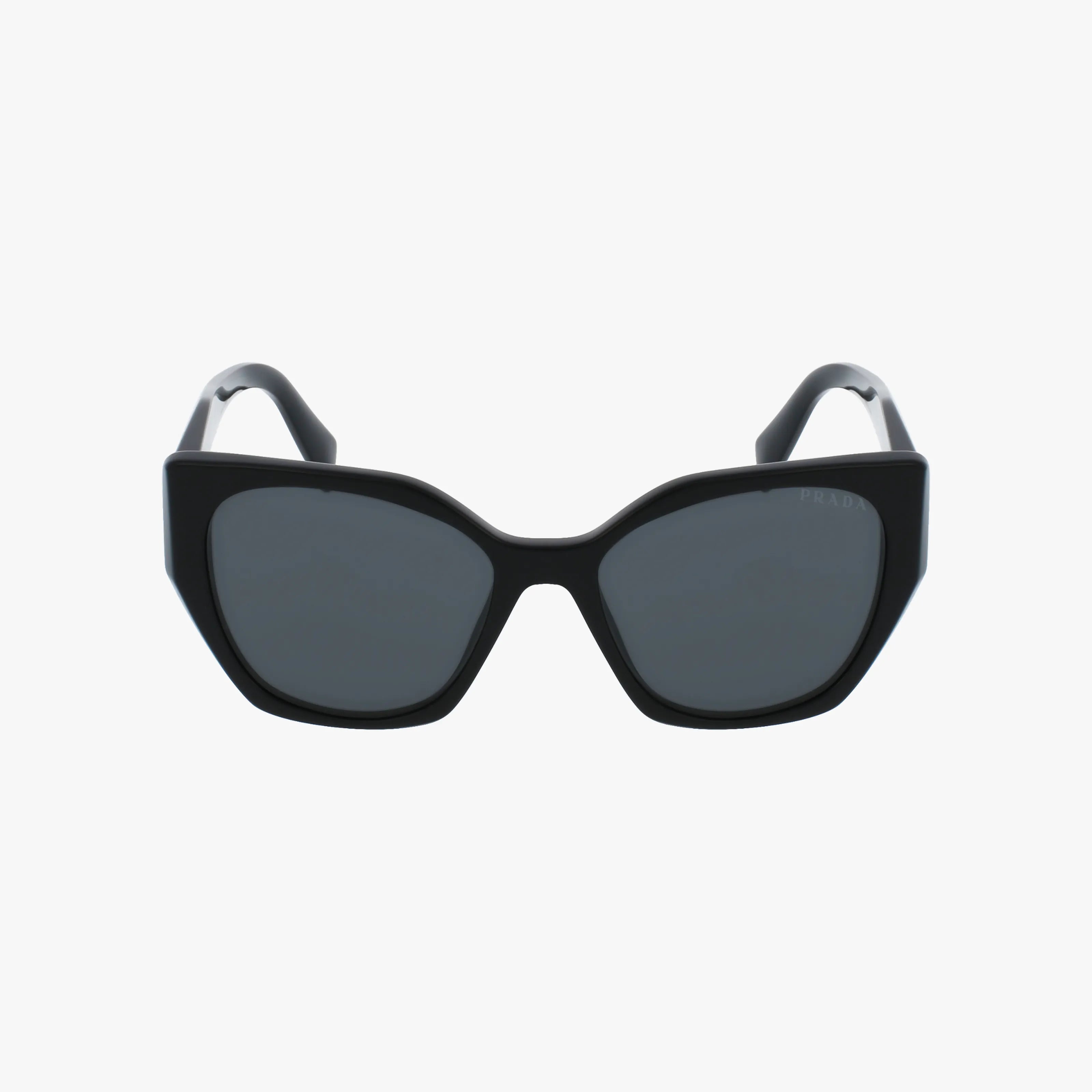 The PR19ZS features black geometric cat-eye frames with dark tinted lenses. Lightweight and stylish, their bold, angular design updates classic sunglasses for a modern look. Shown against a plain white background.