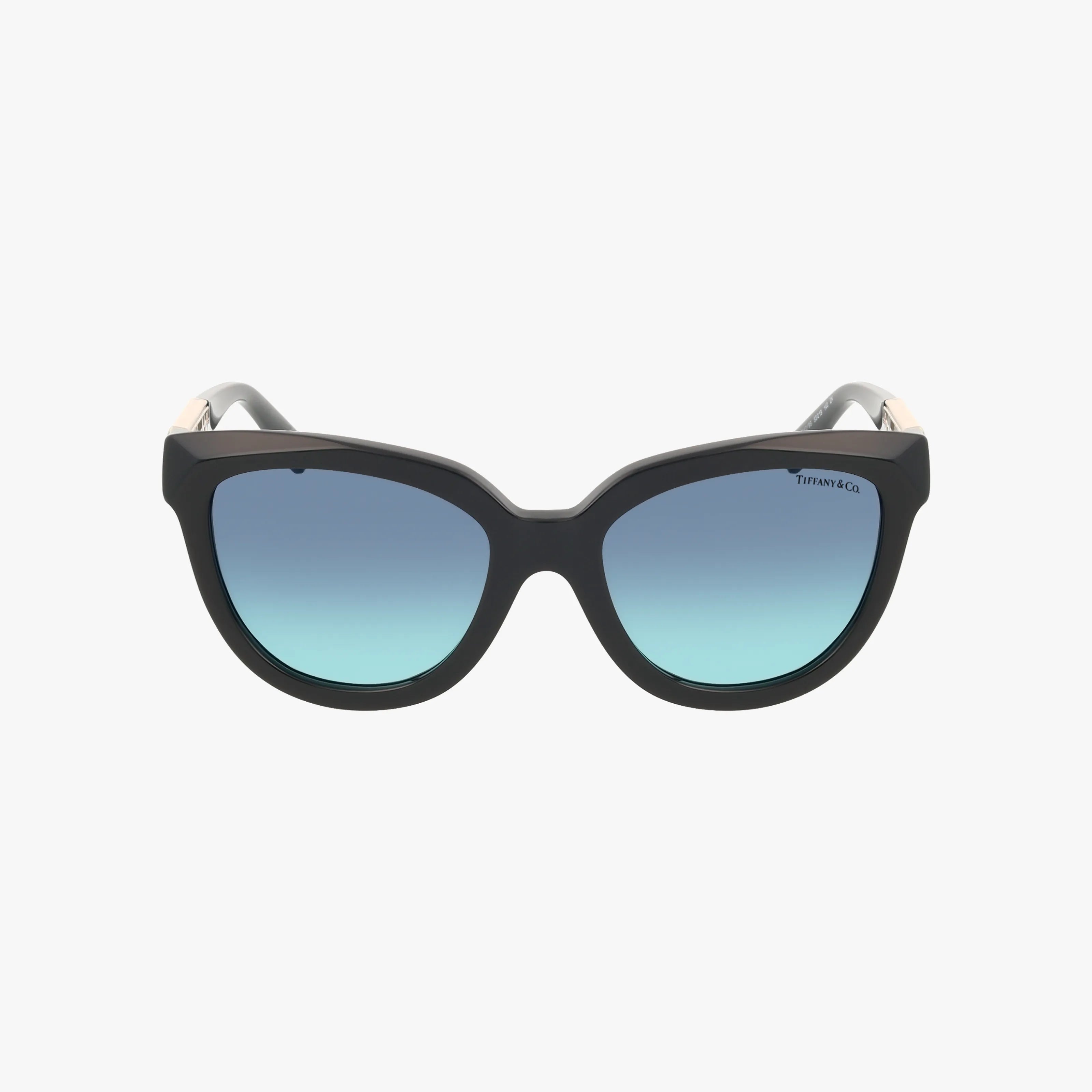 TF4215 cat-eye sunglasses feature bold black frames and blue gradient lenses, ideal for outdoor adventures. Shop these stylish shades or explore more options online, all showcased on a plain white background.