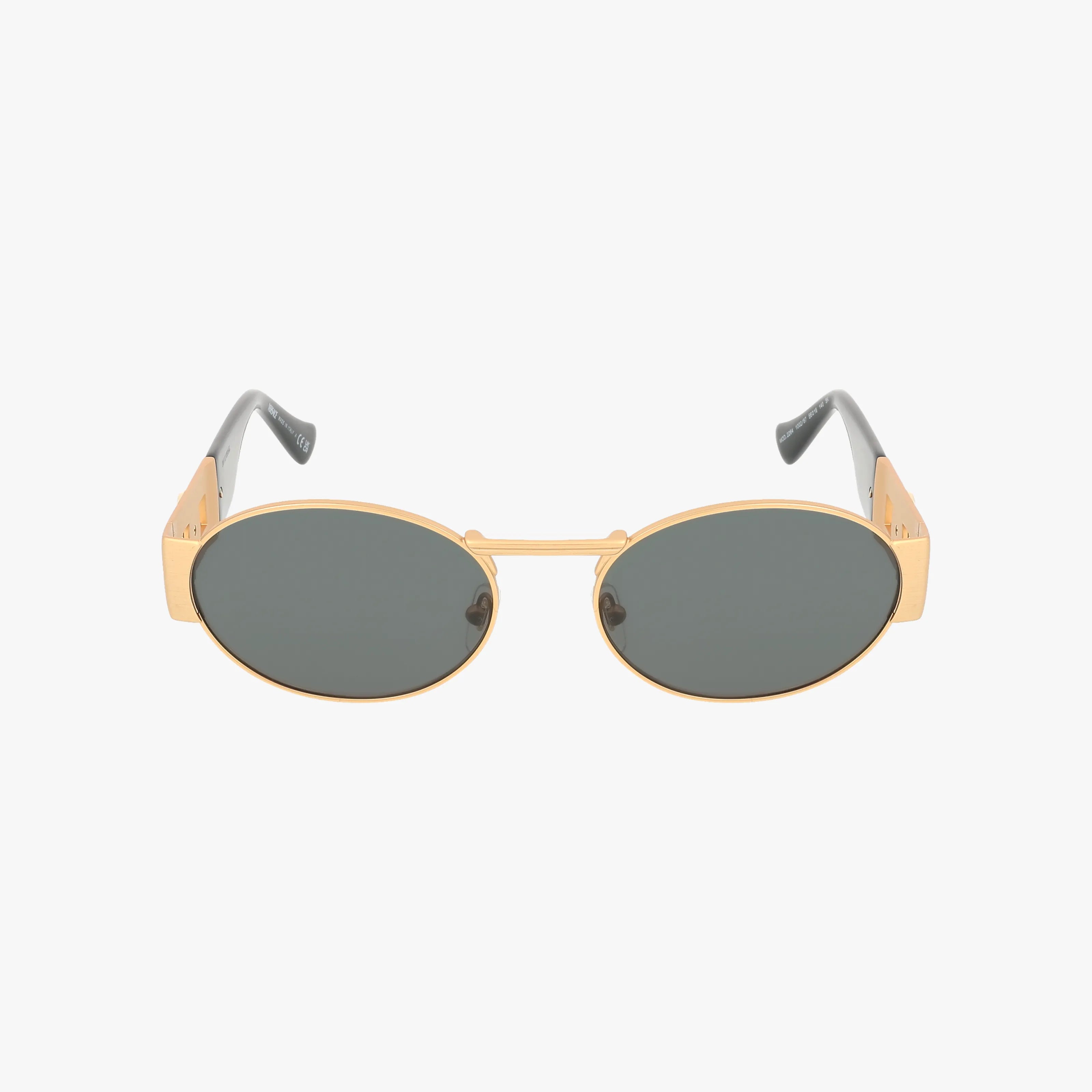 The VE2264 sunglasses feature a gold-framed oval modern design with dark tinted lenses, gray temple arms, and a durable frame, displayed against a white background.