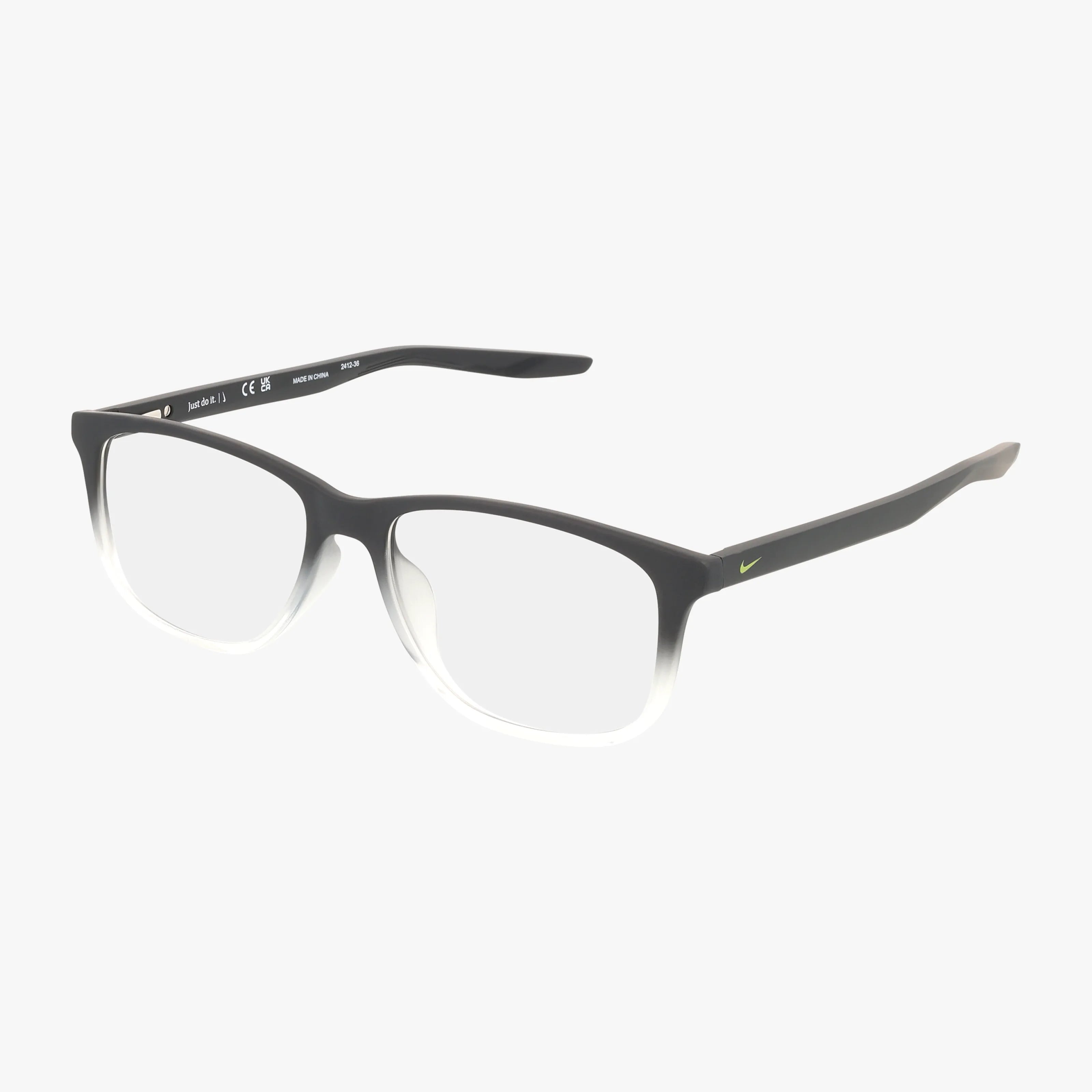 The NIKE 5019 rectangular eyeglasses feature a black and white gradient frame with clear lenses and a stylish green accent on the temples. Shown on a white background, these chic glasses are perfect for online shopping.