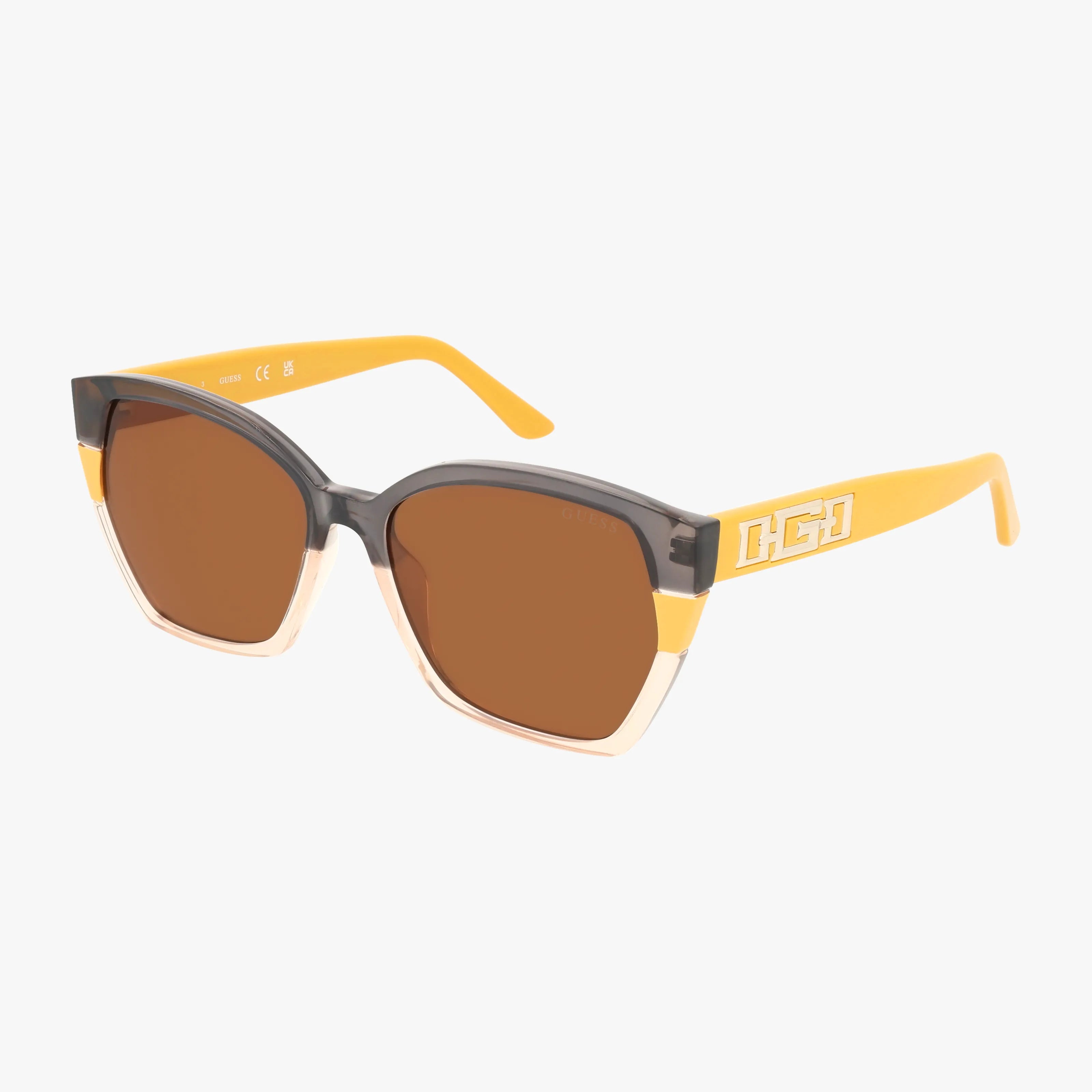 The GU7912S sunglasses feature square brown lenses, black and beige rims, and yellow arms with a white geometric logo. They offer a durable design with UV protection. Displayed on a plain white background.