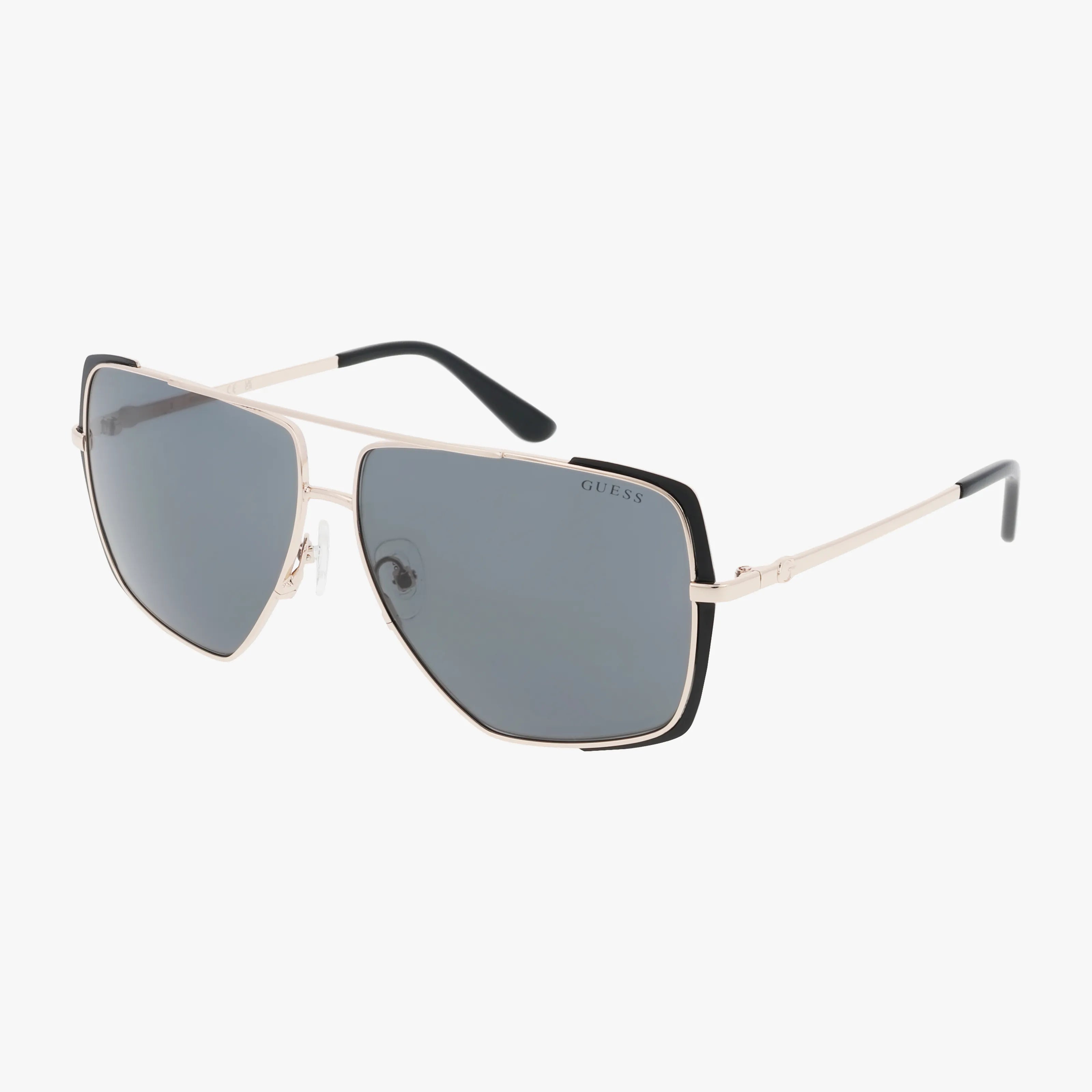 Sleek aviator-style GU00220 sunglasses with gold metal frames, dark rectangular lenses, and thin black-tipped arms, featuring the brand name GUESS on the upper corner of the right lens.