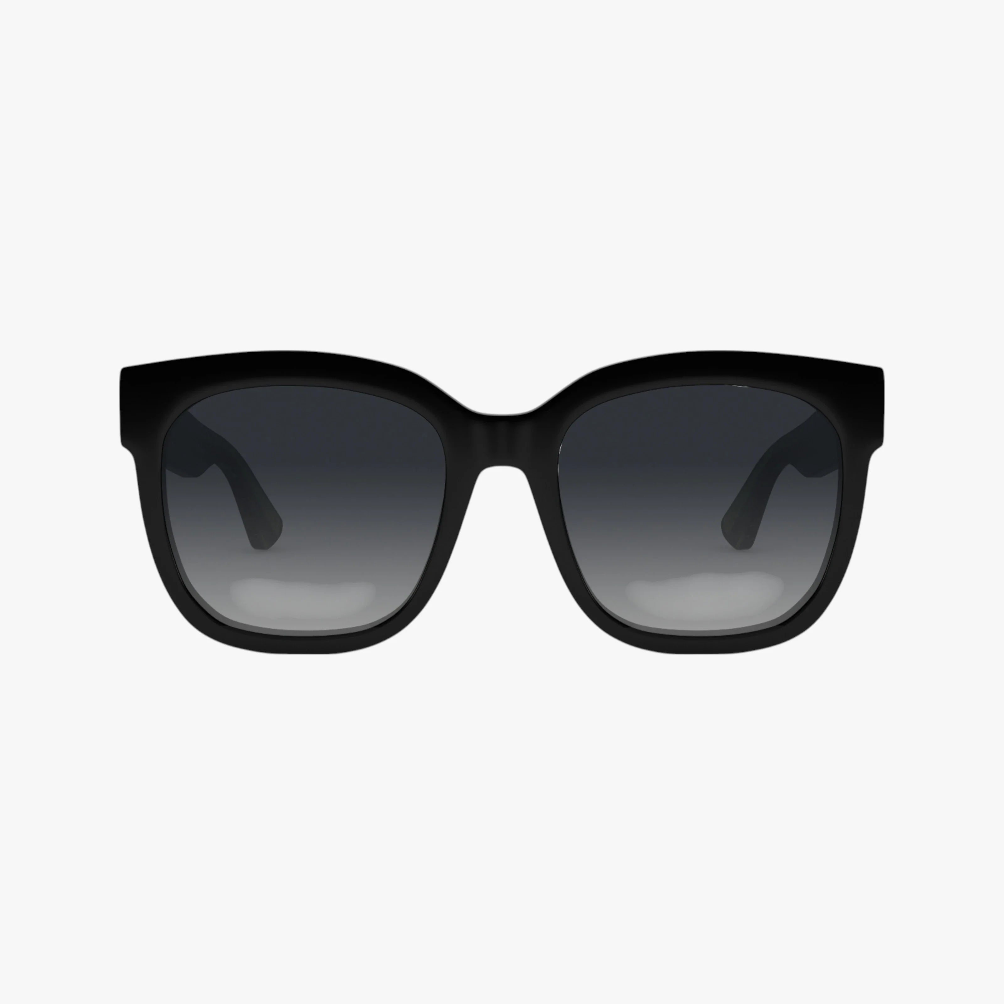 A pair of black rectangular GG0034SN sunglasses with dark gradient lenses, shown against a plain white background.