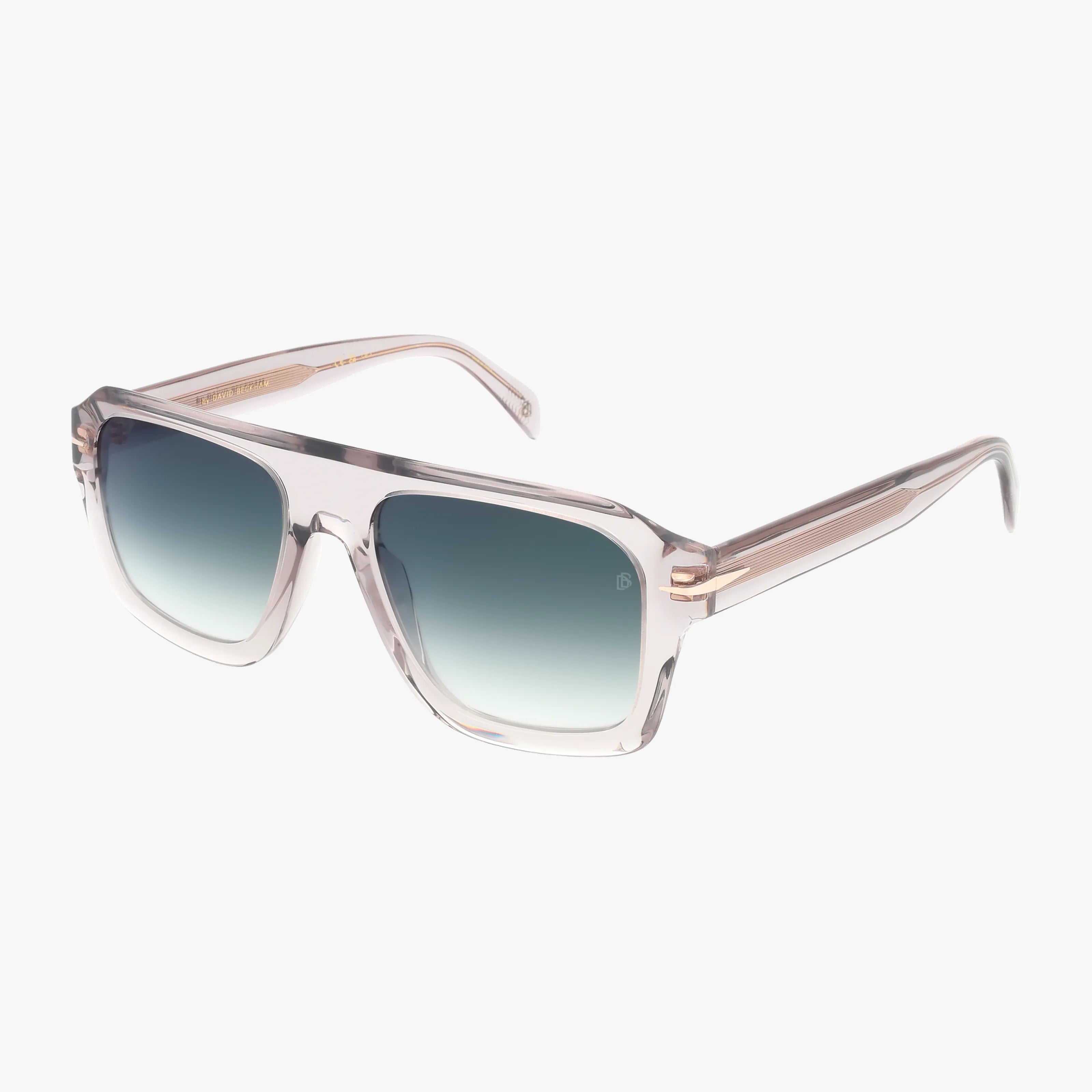 The DB 7127/S features transparent square frames with a subtle pink tint and blue gradient lenses, offering durable style for those shopping glasses online. Shown on a white background.