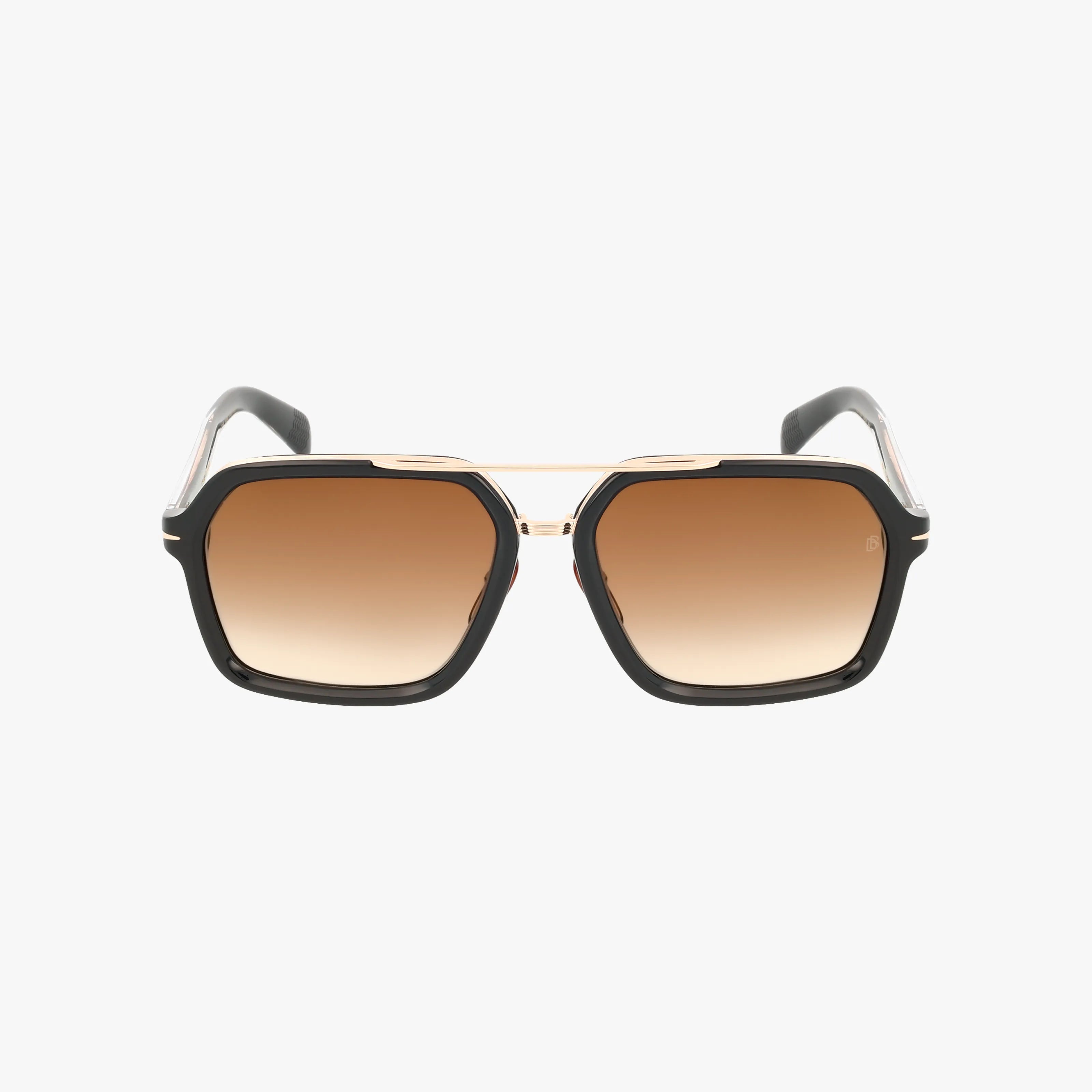 The DB 7128/S sunglasses feature a chic square black frame with gold accents above the nose bridge, brown gradient lenses, and are elegantly displayed on a white background.