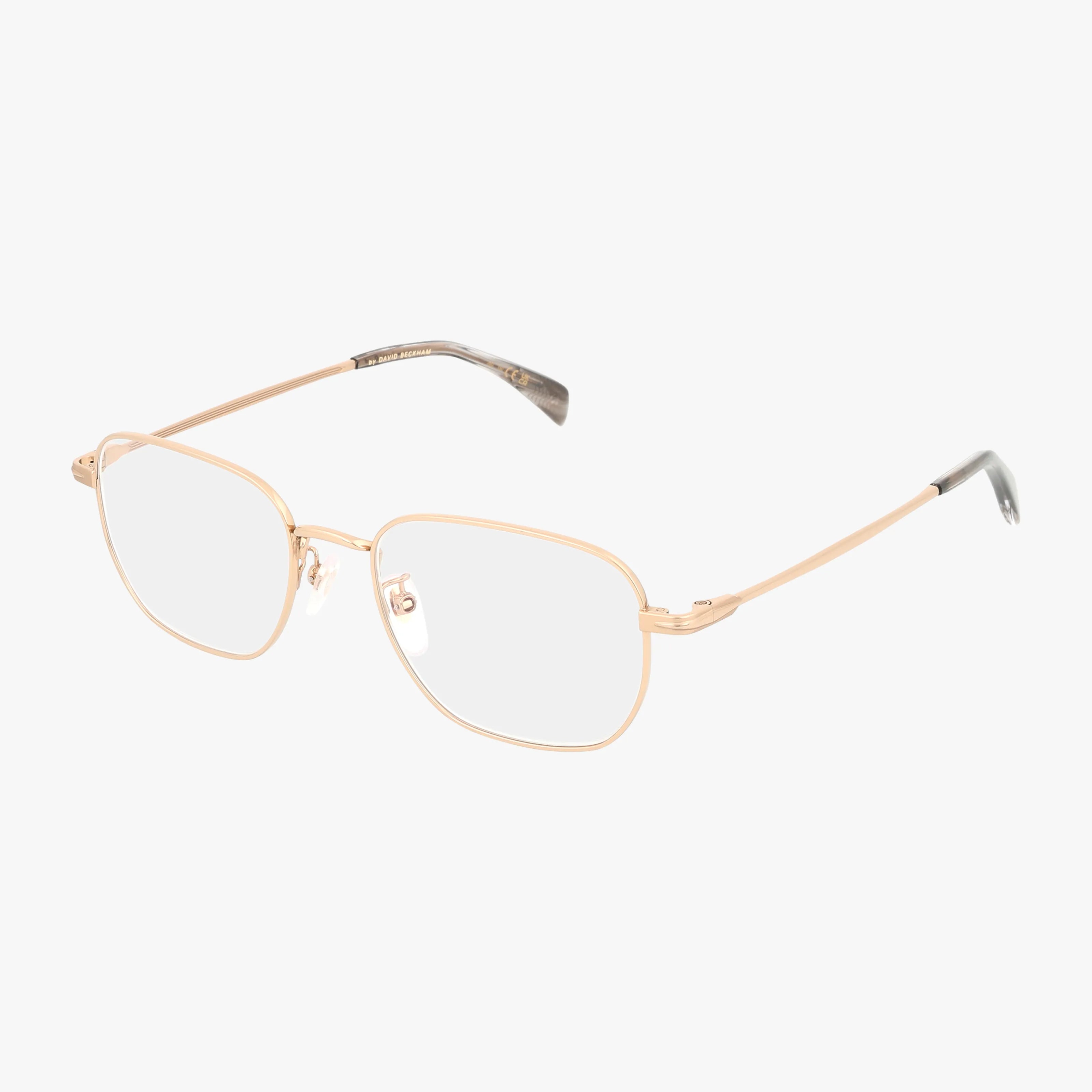 DB 1168/F gold metal rectangular eyeglasses feature durable frames, clear lenses, a slim profile, adjustable nose pads, and slightly curved temple arms with dark tips, shown on a white background.