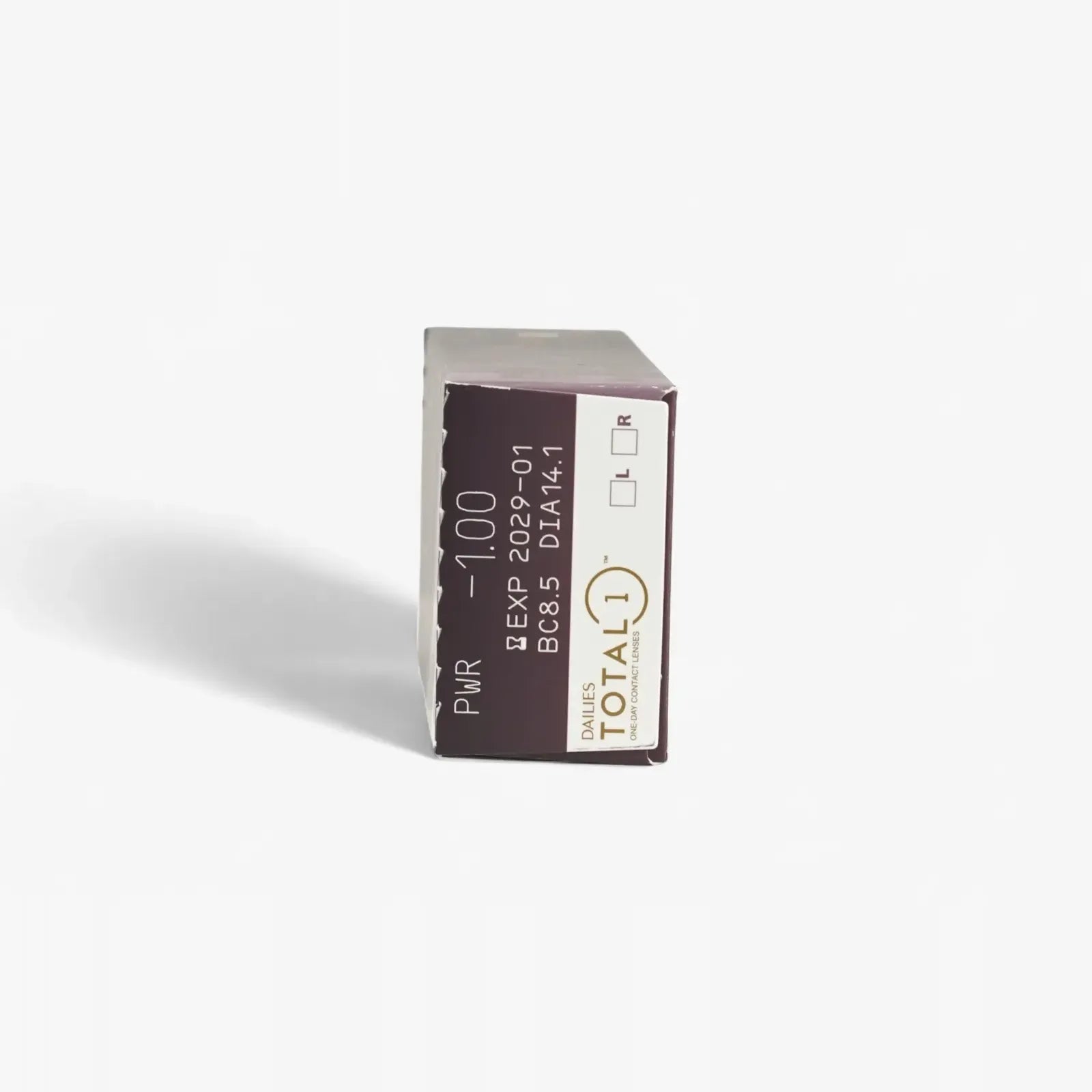 A brown and white box of Dailies Total 1 - 30 Pk water gradient contact lenses rests on a white background, displaying prescription details and the brand name on the front.