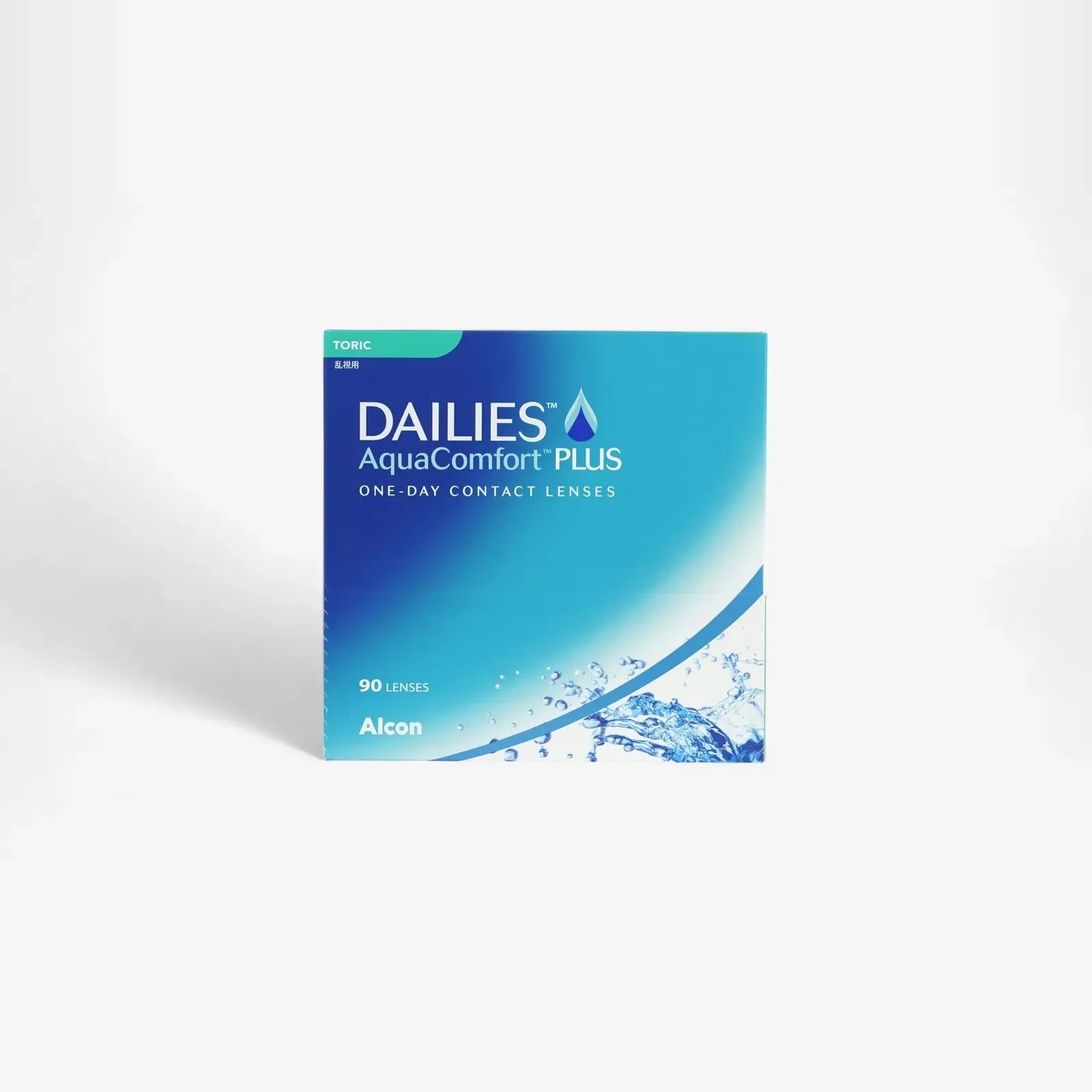 A box of Dailies Aqua Comf Plus Toric - 90Pk daily toric contact lenses for astigmatism by Alcon, featuring blue and green gradient colors, water droplet graphics, and text indicating 90 lenses for daily use.
