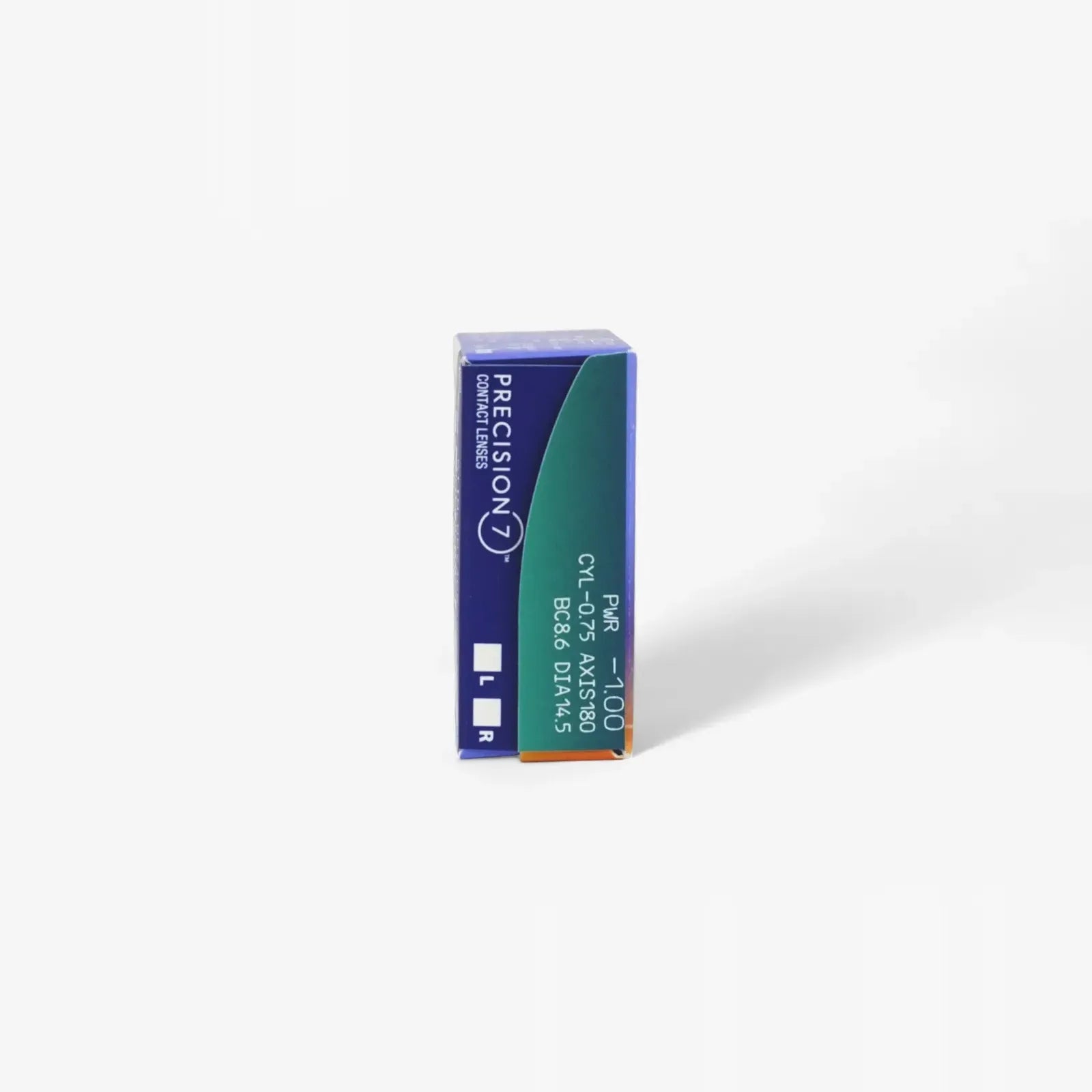 A blue and green box of Precision 7 For Astigmatism - 12Pk contact lenses stands upright on a white surface, with the product name, SMARTSURFACE Technology, and prescription details visible on the front.