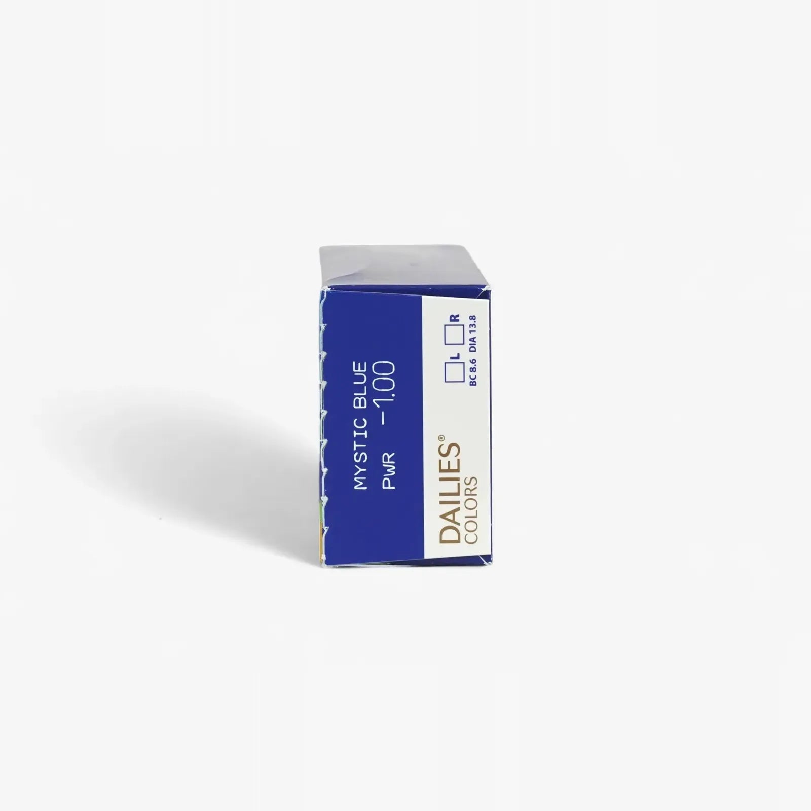 A blue and white box of Dailies Colors - 30 Pk daily contact lenses in Mystic Blue, power -1.00, stands upright against a plain white background for natural eye color enhancement.
