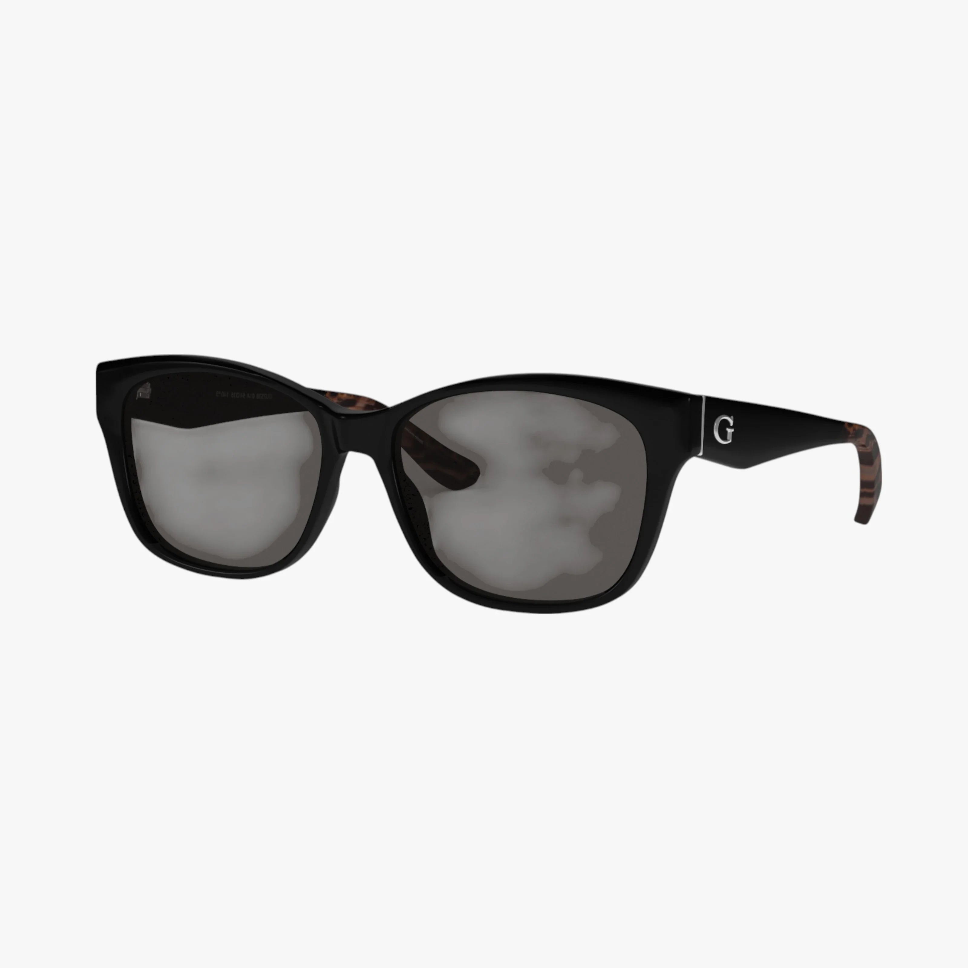 The GU7538S sunglasses feature slightly rounded rectangular black frames, a silver G logo on the left temple, and brown tortoiseshell accents on the inner arms, displayed against a plain white background.