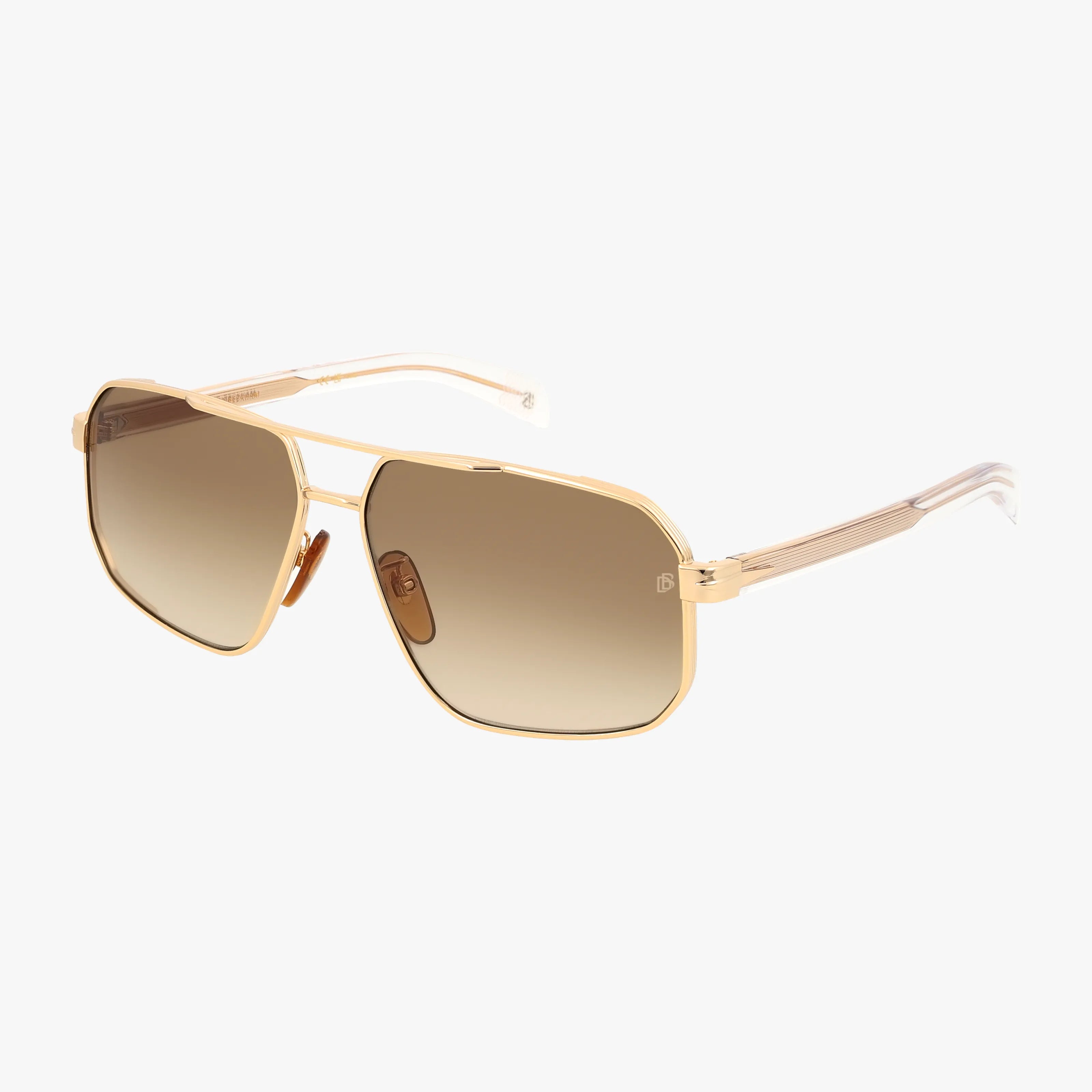 The DB 7102/S features gold aviator frames, brown gradient lenses, a double bridge, and slim temples—ideal for outdoor adventures. Shop these stylish sunglasses and more online, all shown on a white background.