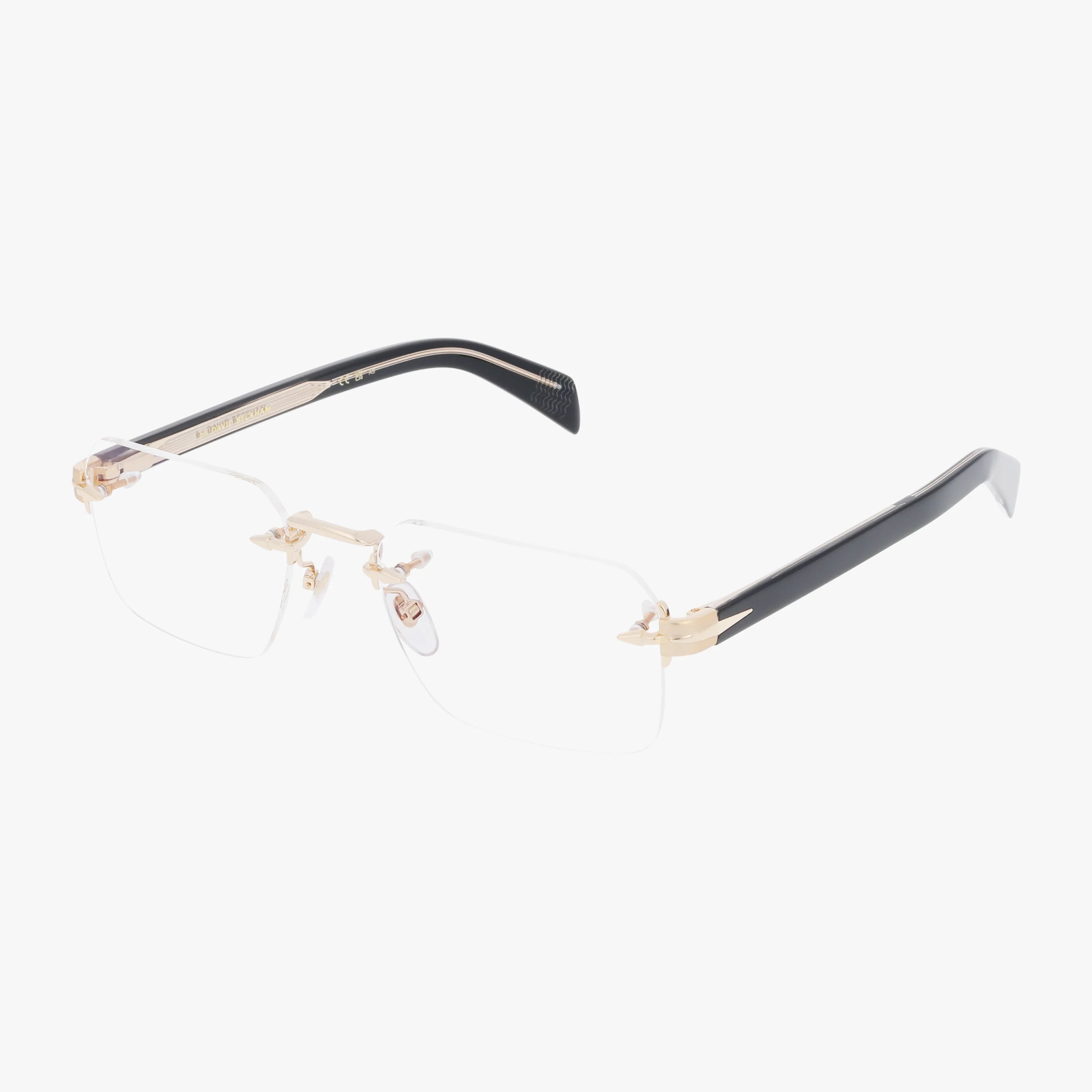 The DB 7116 rimless eyeglasses feature a lightweight frame, gold-tone bridge and hinges, black arms, and clear nose pads, showcasing quality craftsmanship on a white background.