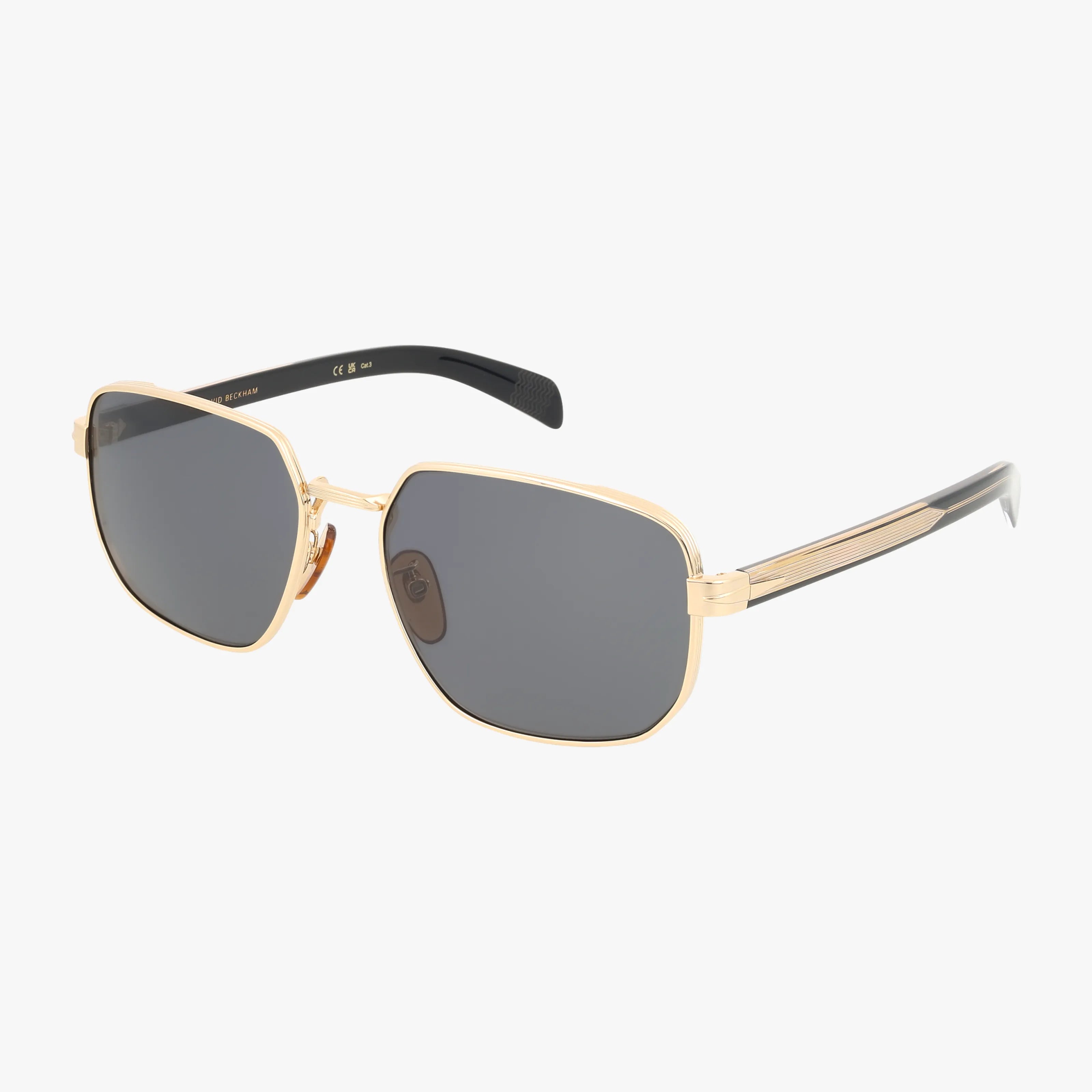 The DB 7121/G/S sunglasses feature a classic gold metal, lightweight frame with black arms and dark rectangular lenses, shown on a white background.