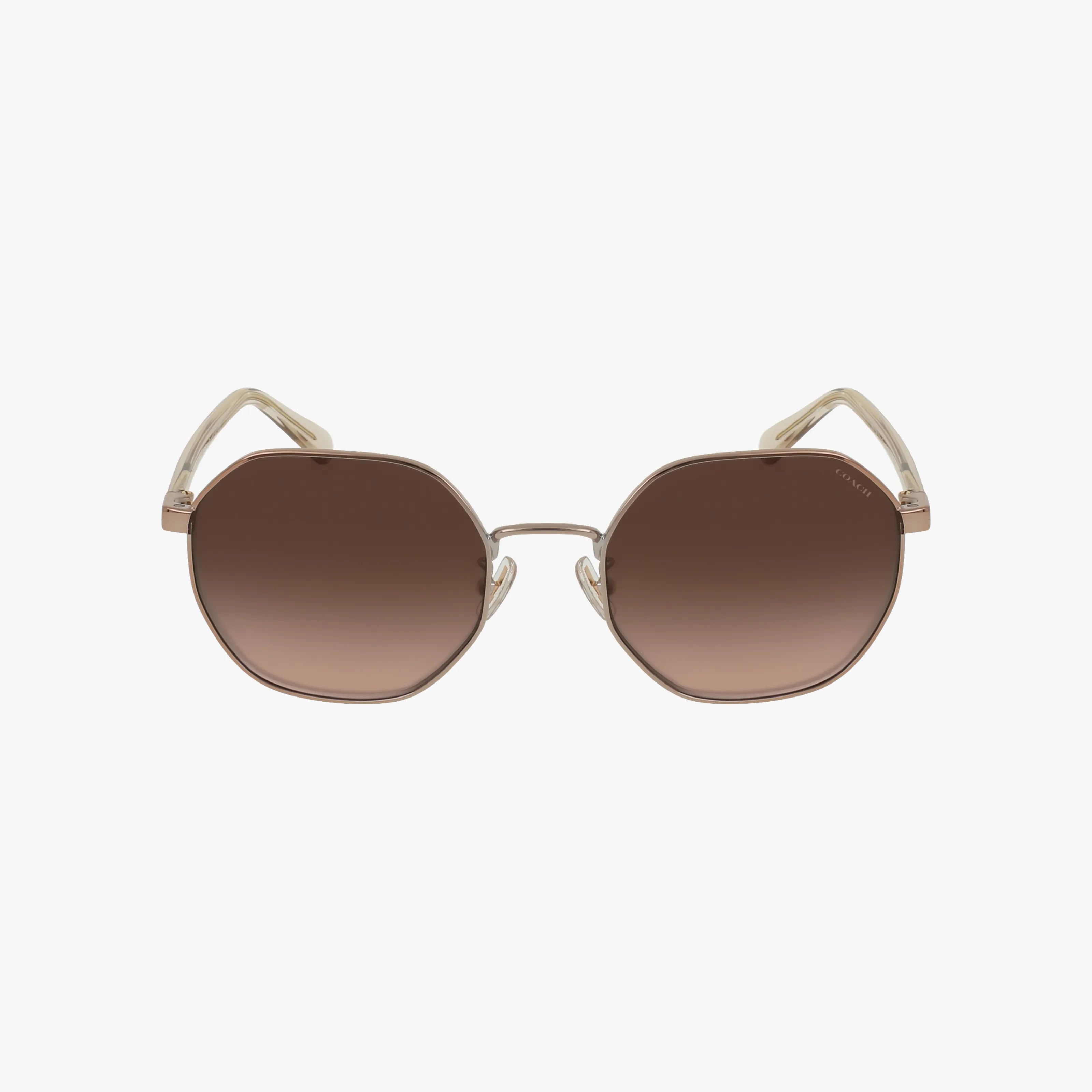 Front view of the HC7147 sunglasses, showcasing large geometric brown gradient lenses and light-toned, gently curved arms, set against a white background.