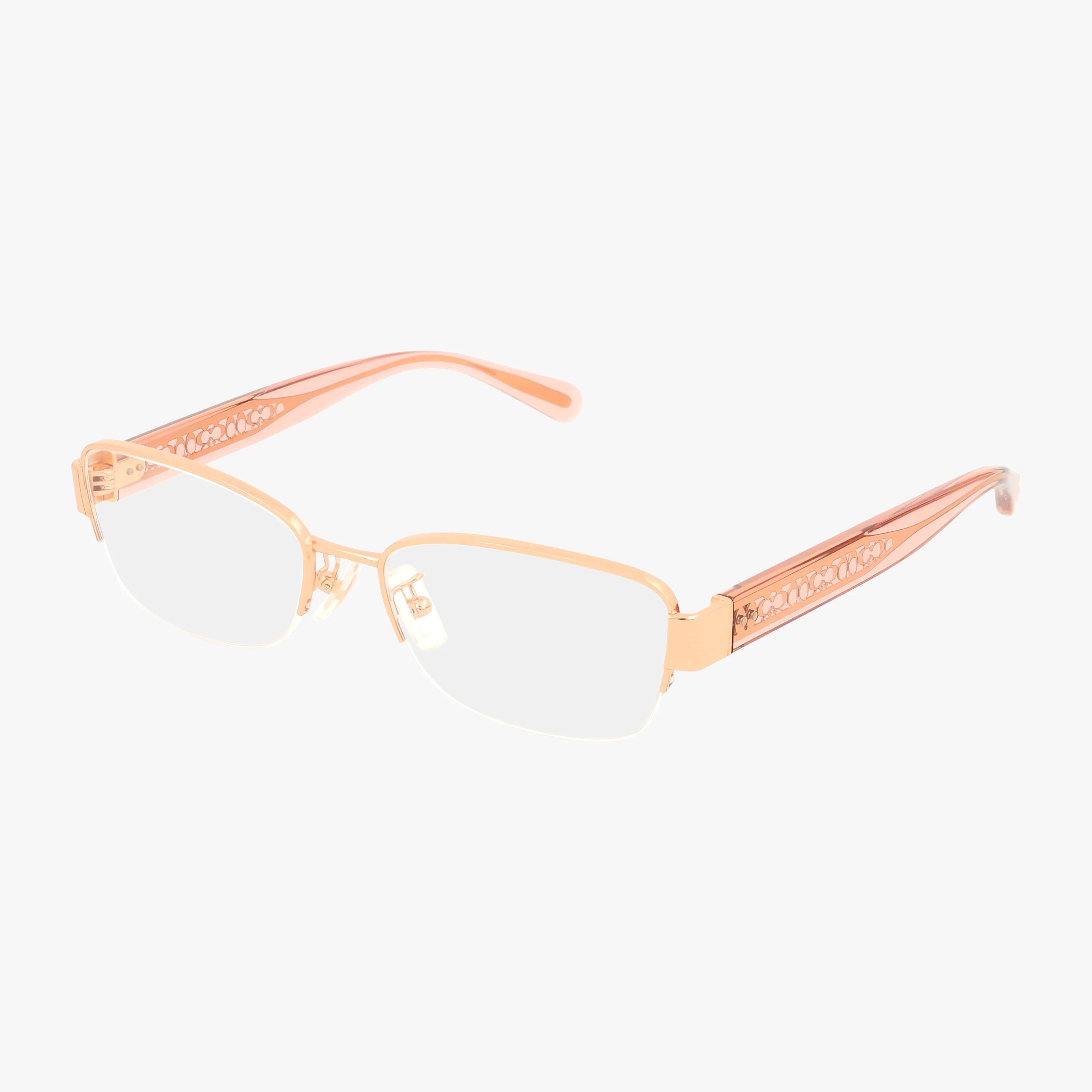 The HC5168 eyeglasses feature a semi-rimless gold metal frame with translucent peach arms and elegant cut-out details, offering a blend of classic and modern style, shown on a white background.