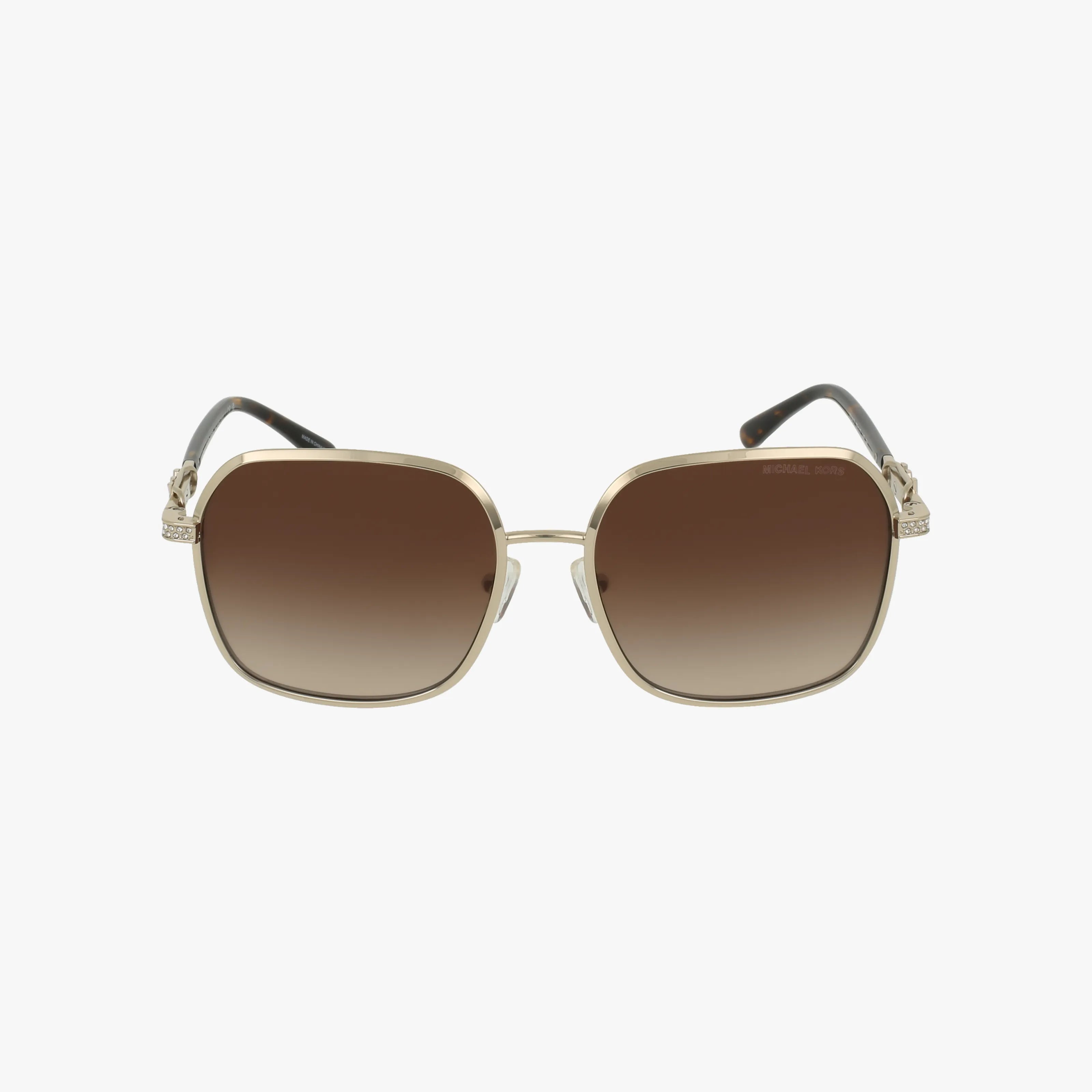 The MK1145B sunglasses feature a gold metal square frame by Michael Kors with brown gradient lenses and subtle temple details, shown on a plain white background.