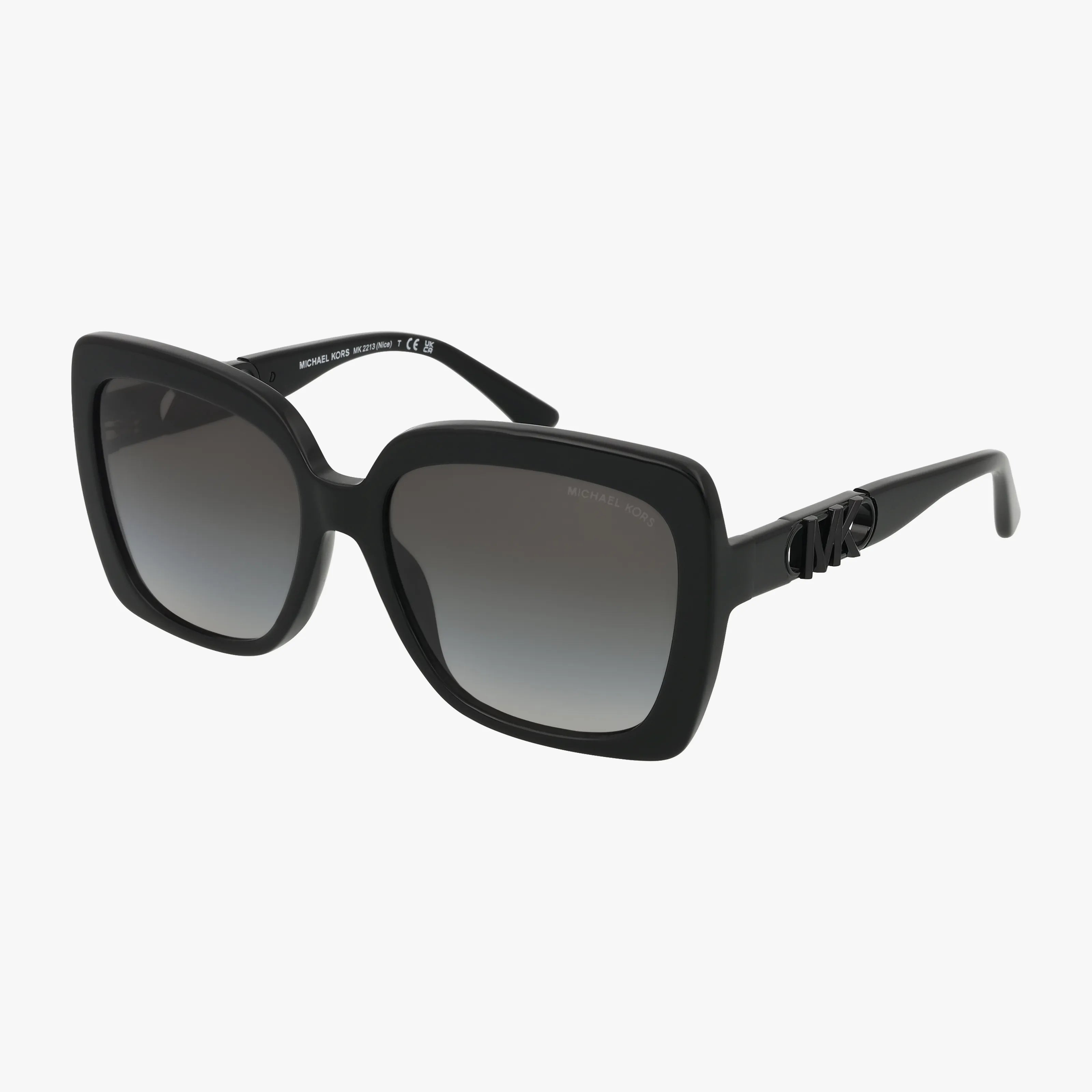 The MK2213 black oversized square sunglasses feature dark gradient lenses, thick frames, and a raised MK logo on the arms near the hinges. This modern, classic design is displayed on a white background.