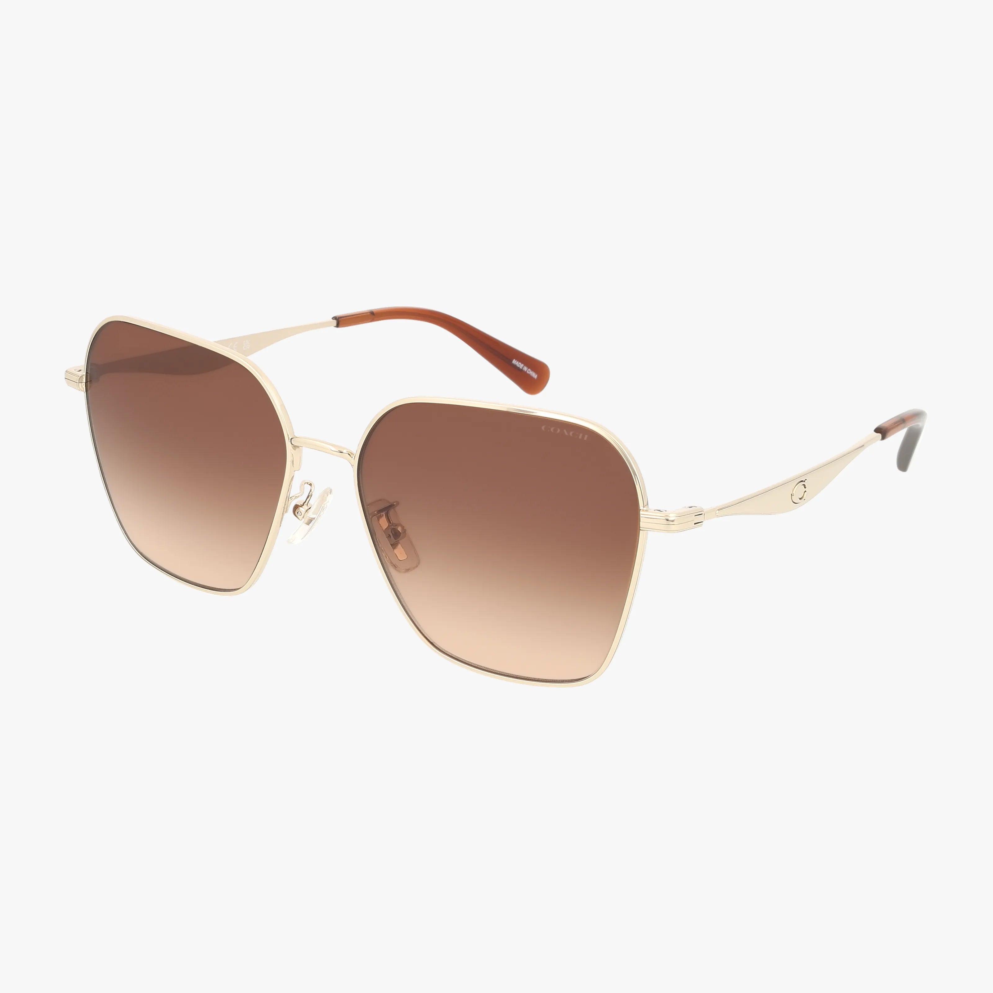 The HC7168 sunglasses feature gold frames in a square shape, brown gradient lenses for advanced protection, slim metal arms, and chic brown tips.