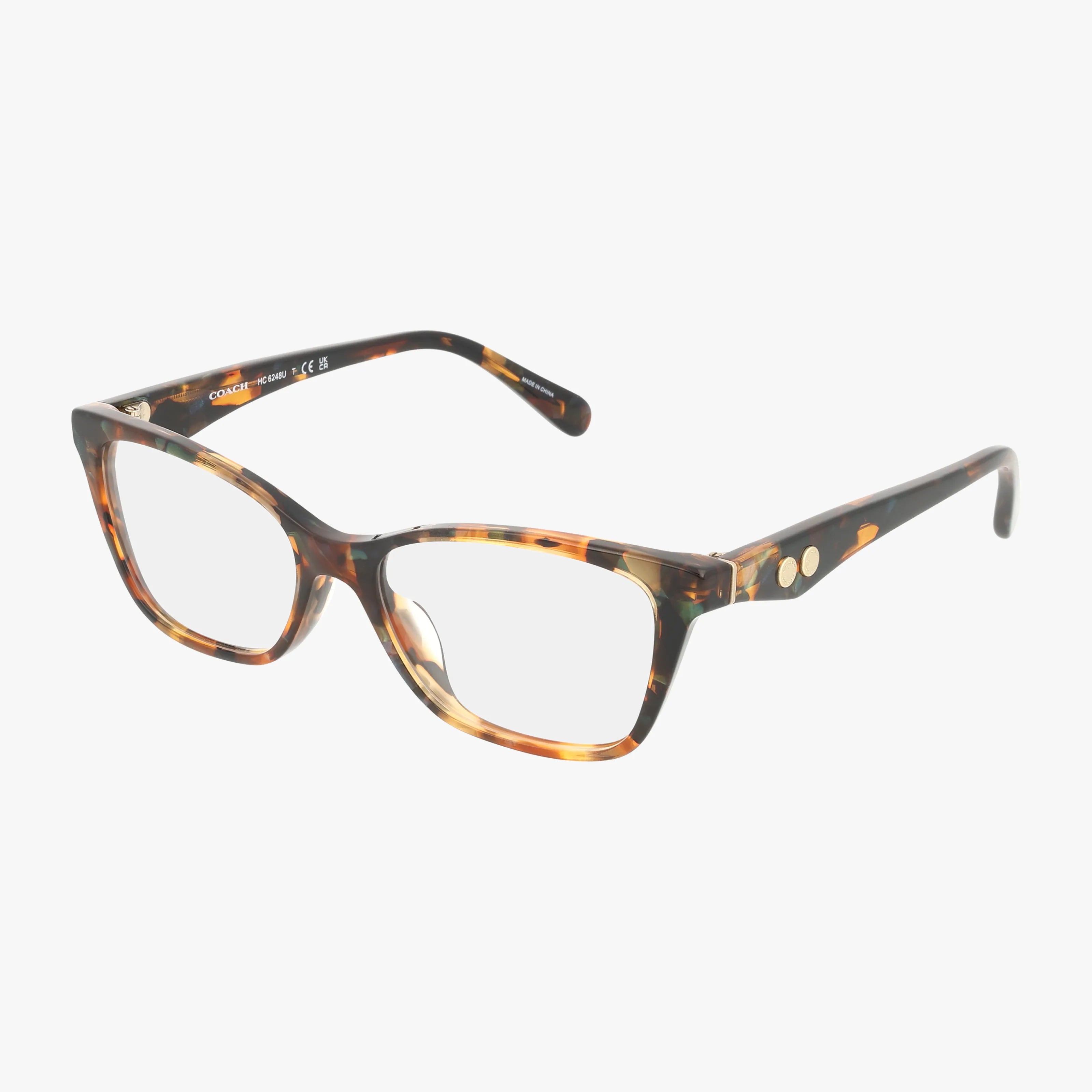 The HC6248U eyeglass frame features brown tortoiseshell rectangular lenses and two small gold dots on each arm, shown against a plain white background.