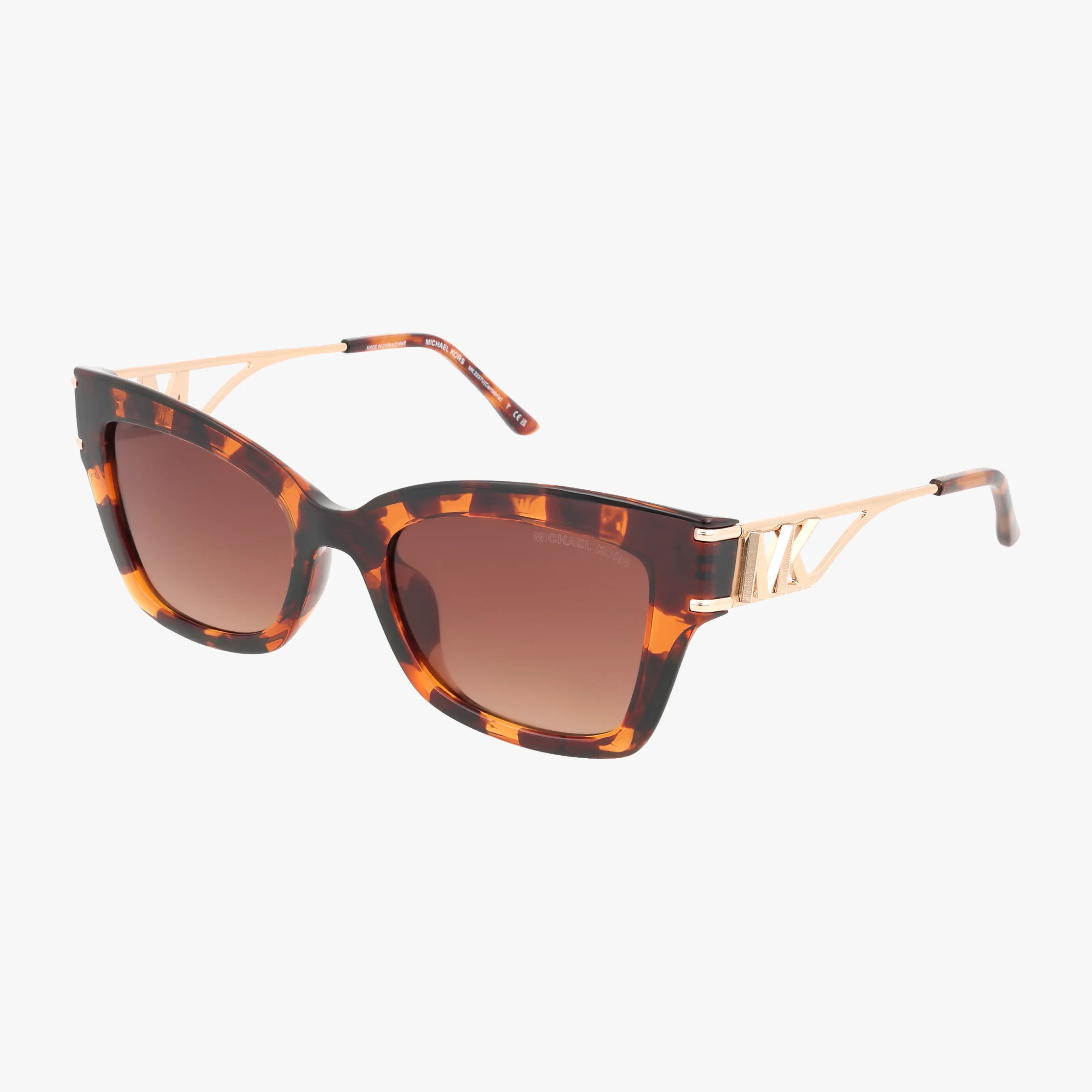 The MKS2237U sunglasses feature a stylish tortoiseshell square frame, lightweight design, gold metal arms, and brown gradient lenses, delivering modern eyewear elegance against a white background.