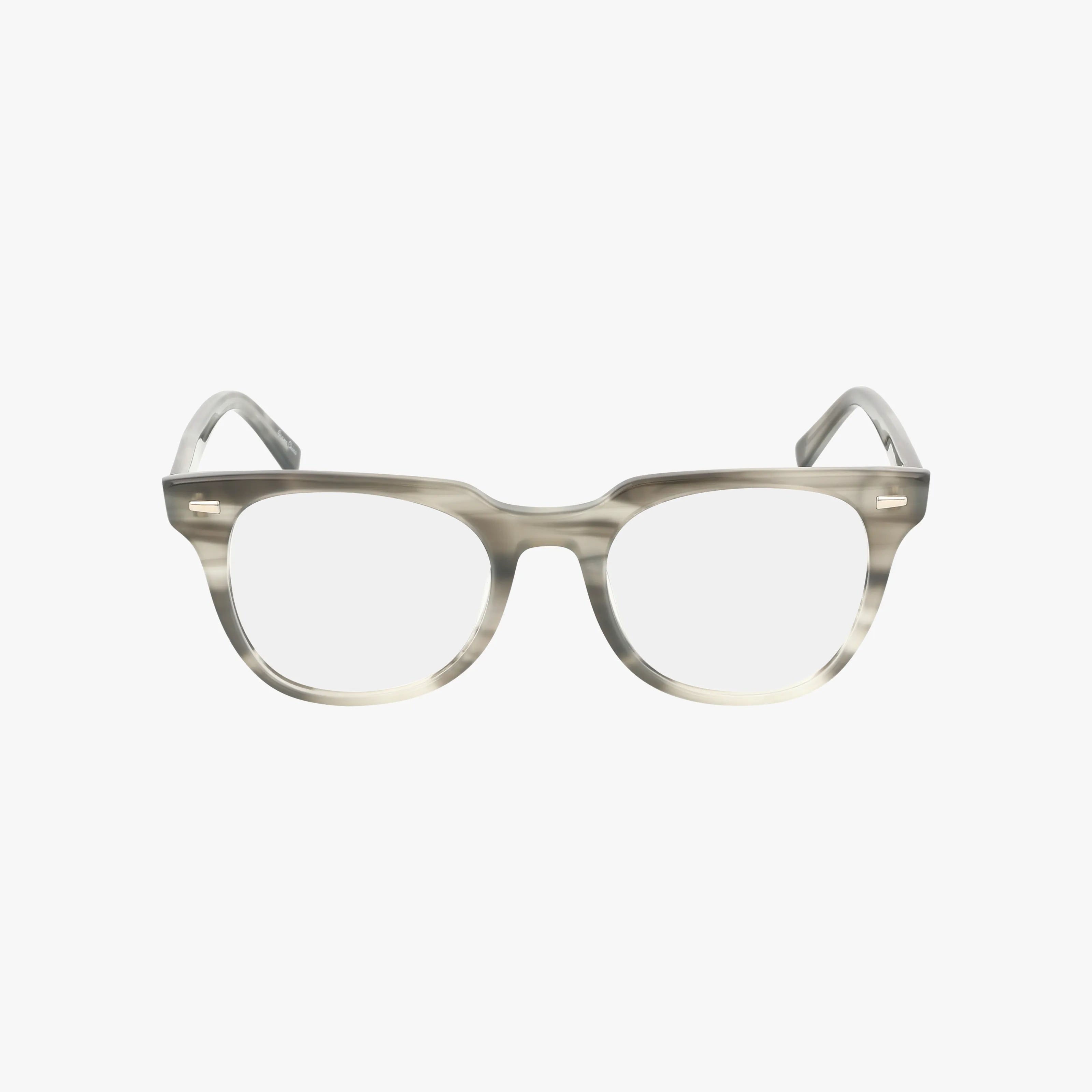 The OMG eyewear features clear, slightly tinted frames and rounded lenses, elegantly displayed on a white background.