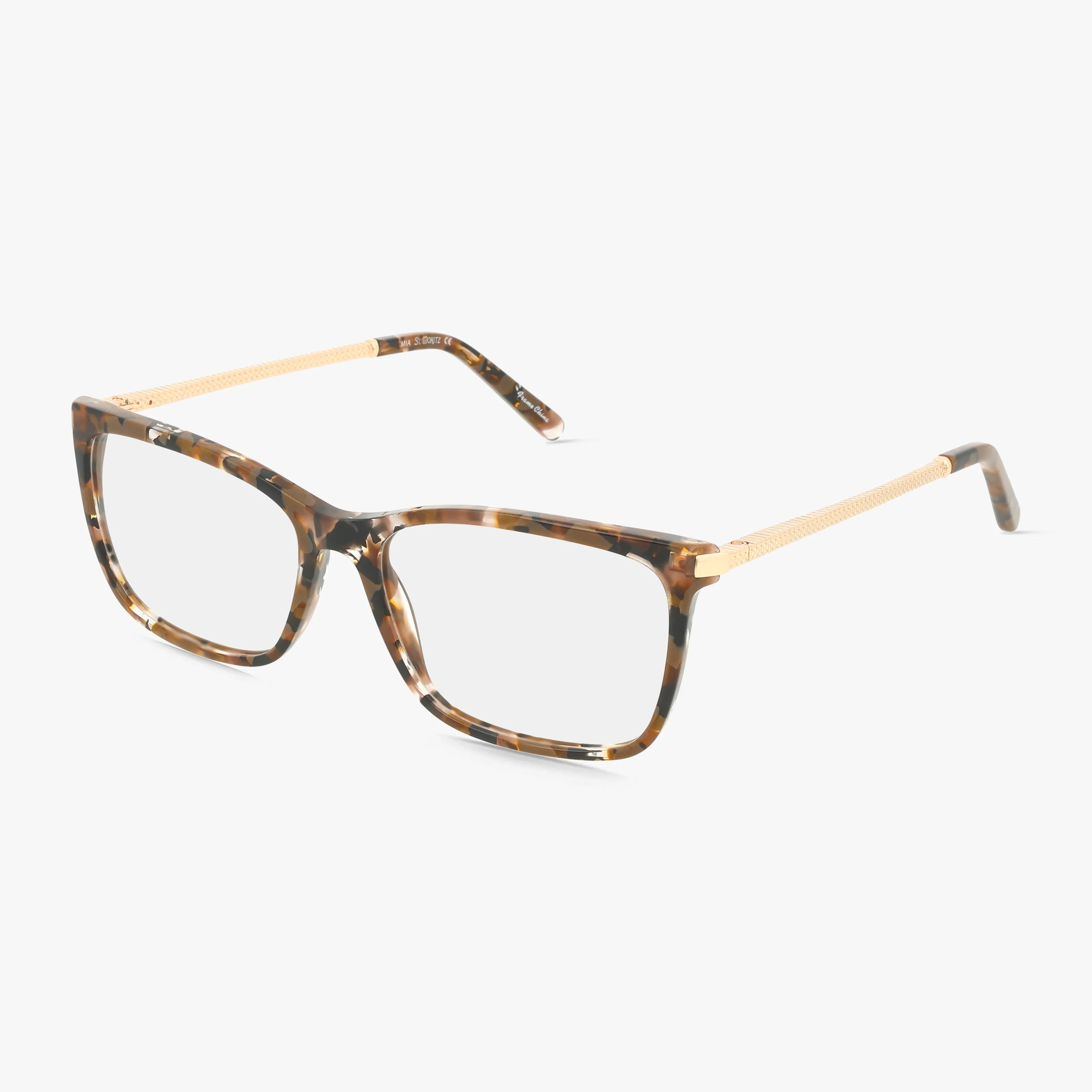 The MIA eyeglasses feature a rectangular brown tortoiseshell frame with gold textured temples, combining contemporary design and stylish eyewear, shown against a white background.