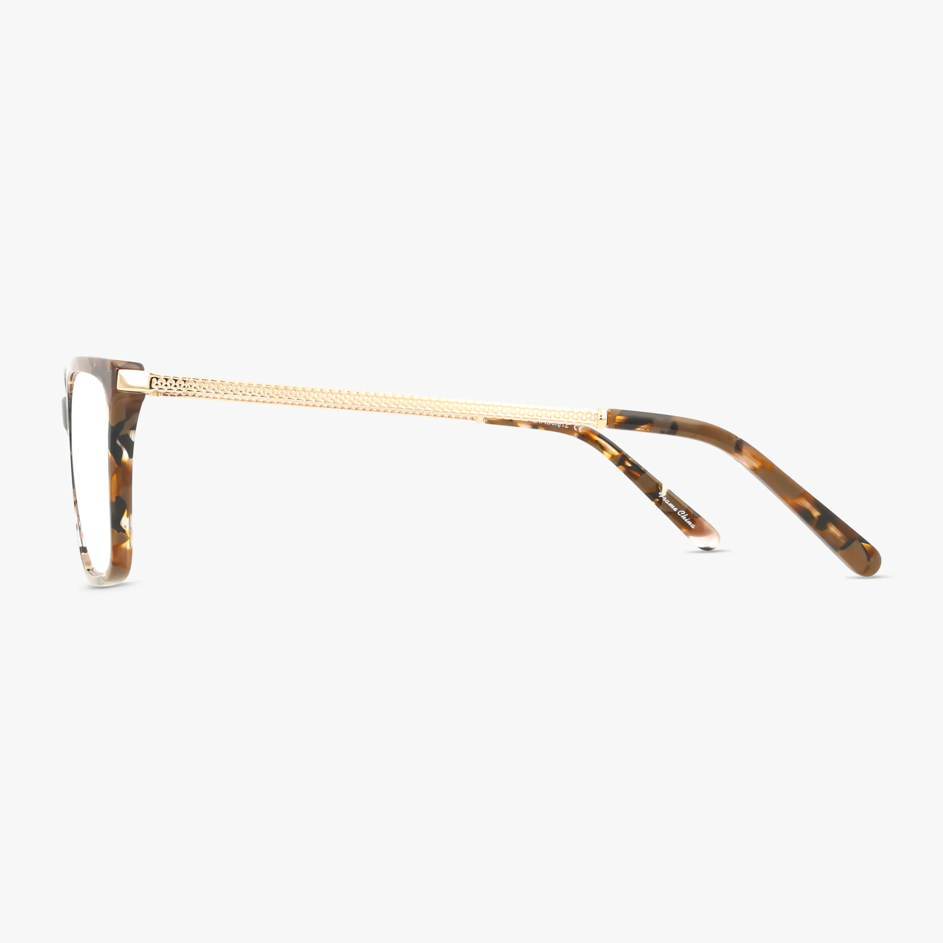 Side view of the MIA eyewear, featuring a tortoiseshell-patterned resilient frame and gold textured metal arms, set against a white background.
