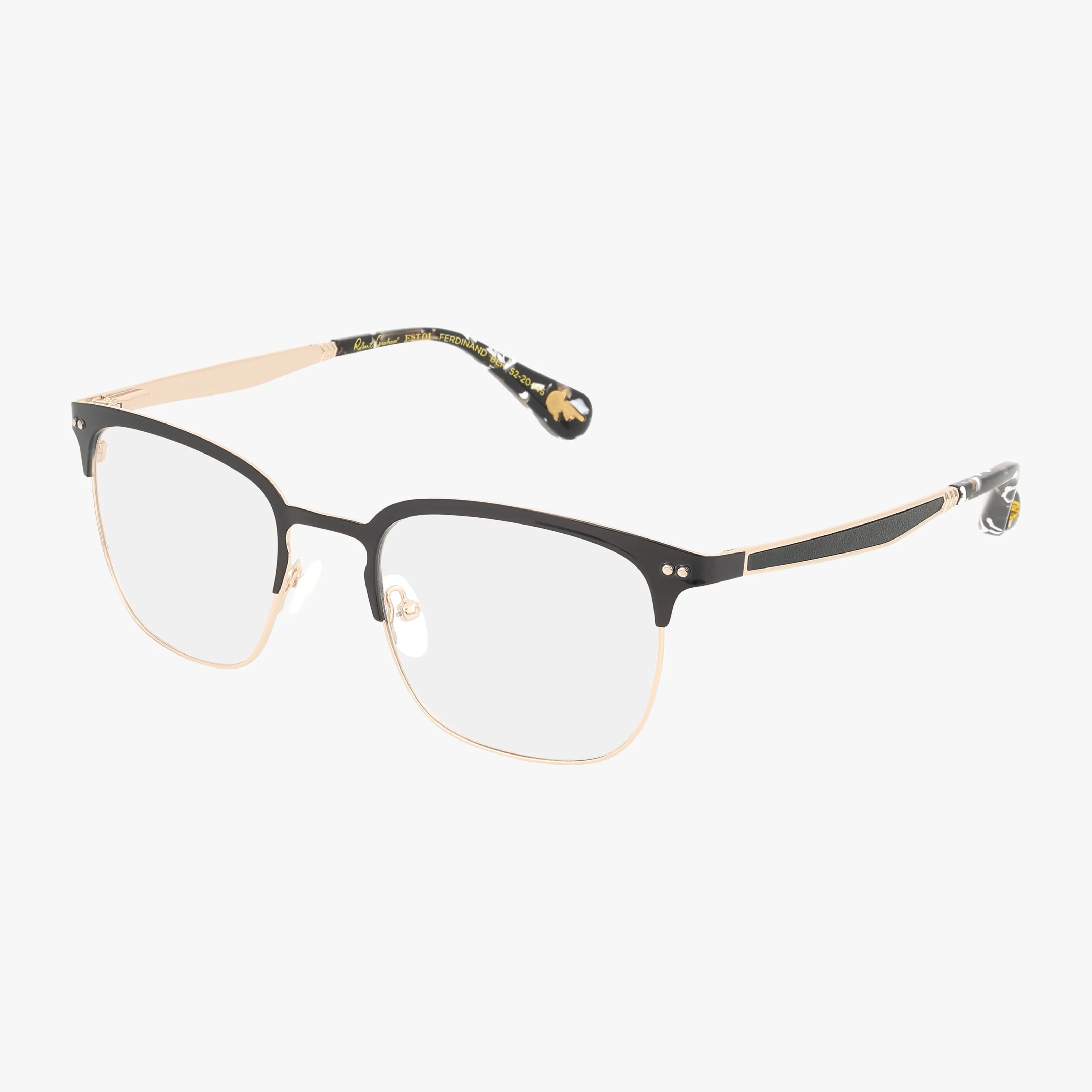 FERDINAND: Stylish eyeglasses featuring a resilient thin gold metal frame, black upper rims, clear lenses, and gold temples with a subtle black design at the tips—ideal for fans of contemporary design.
