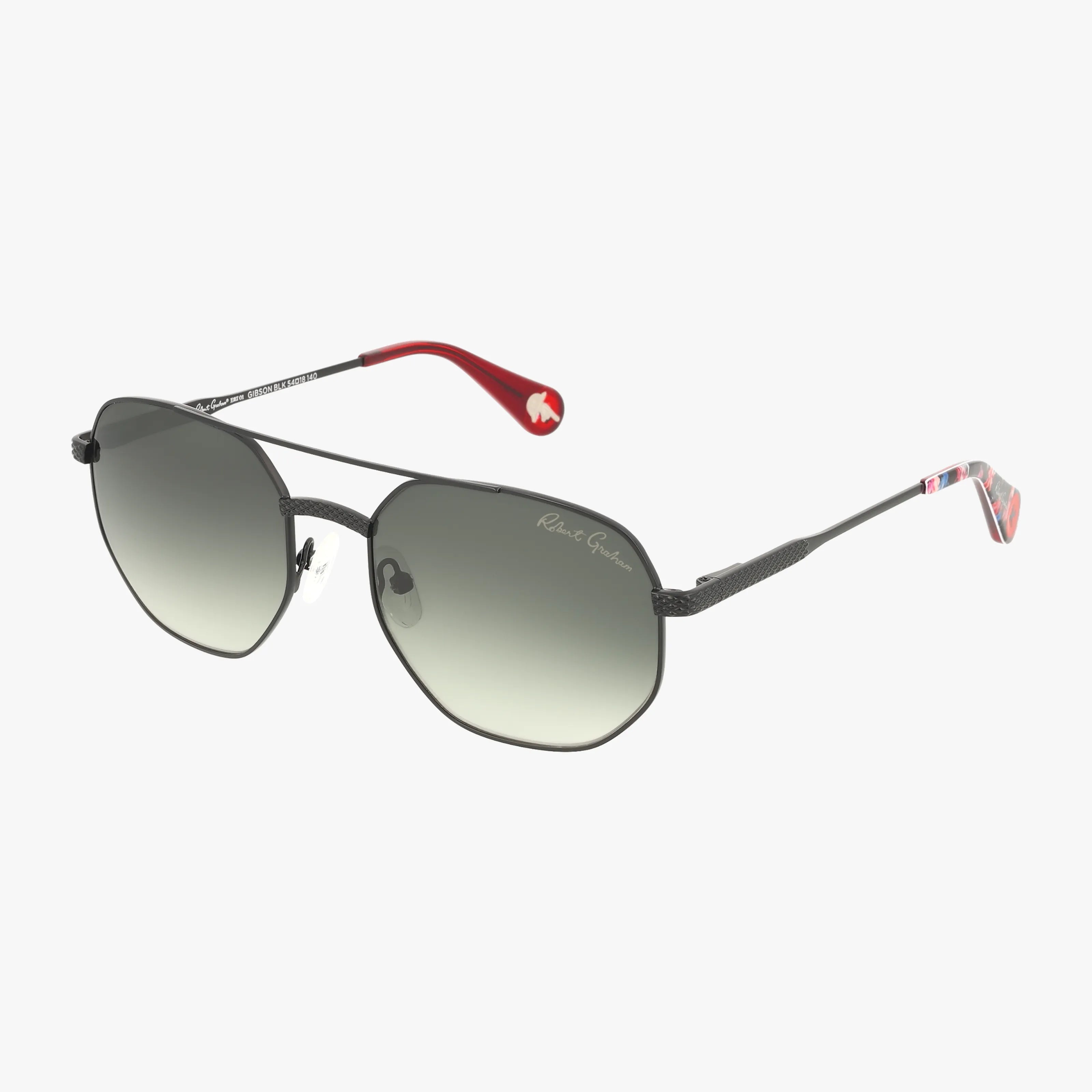 The GIBSON sunglasses feature thin black lightweight frames, gradient lenses, red temple tips with a white logo, and blue arm accents—ideal for anyone looking to buy stylish glasses online with insurance.