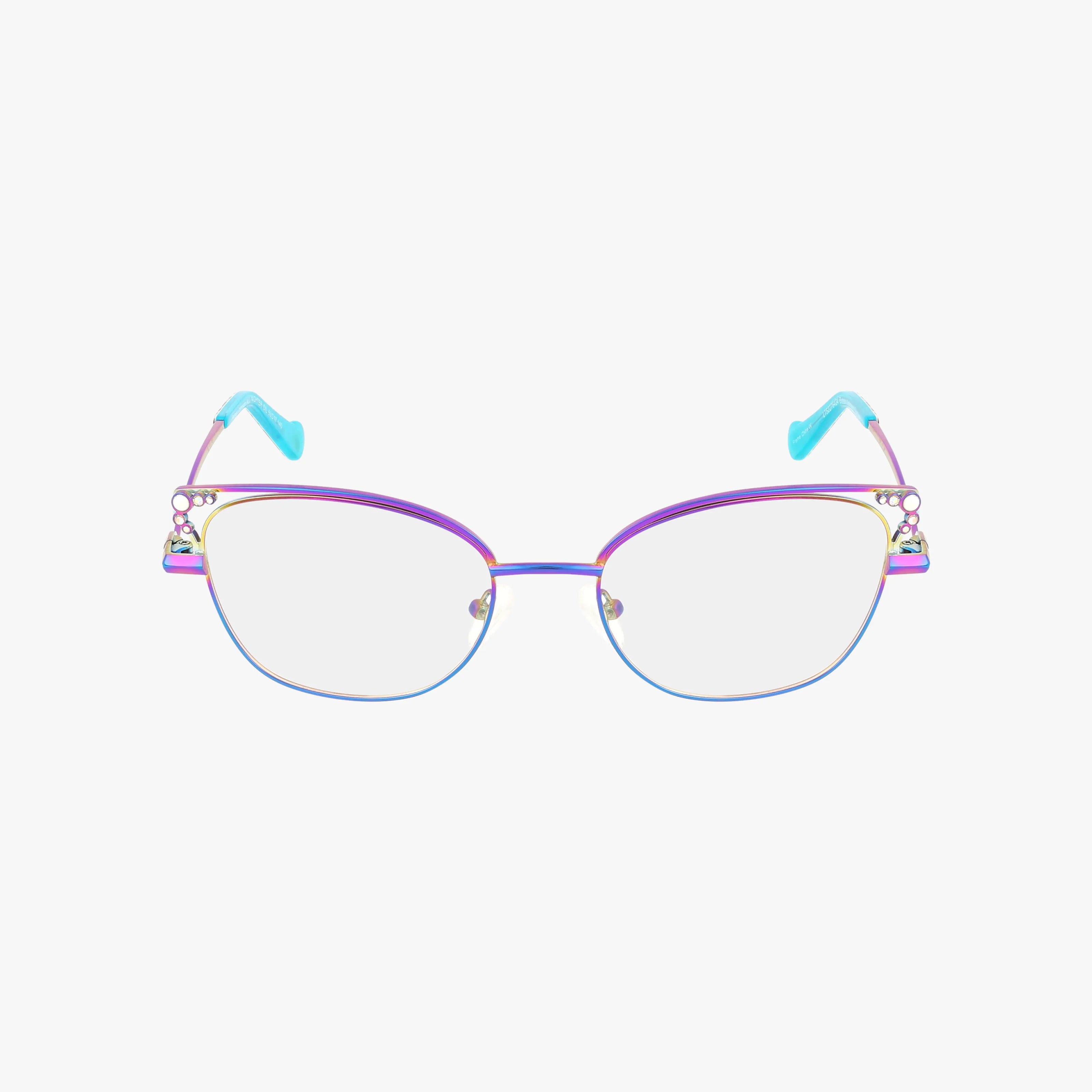The ALL NIGHTER cat-eye glasses by Betsey Johnson feature a gradient purple and gold frame with decorative corner cutouts and light blue temple tips, adding retro flair and unique style to any look. Shown on a white background.