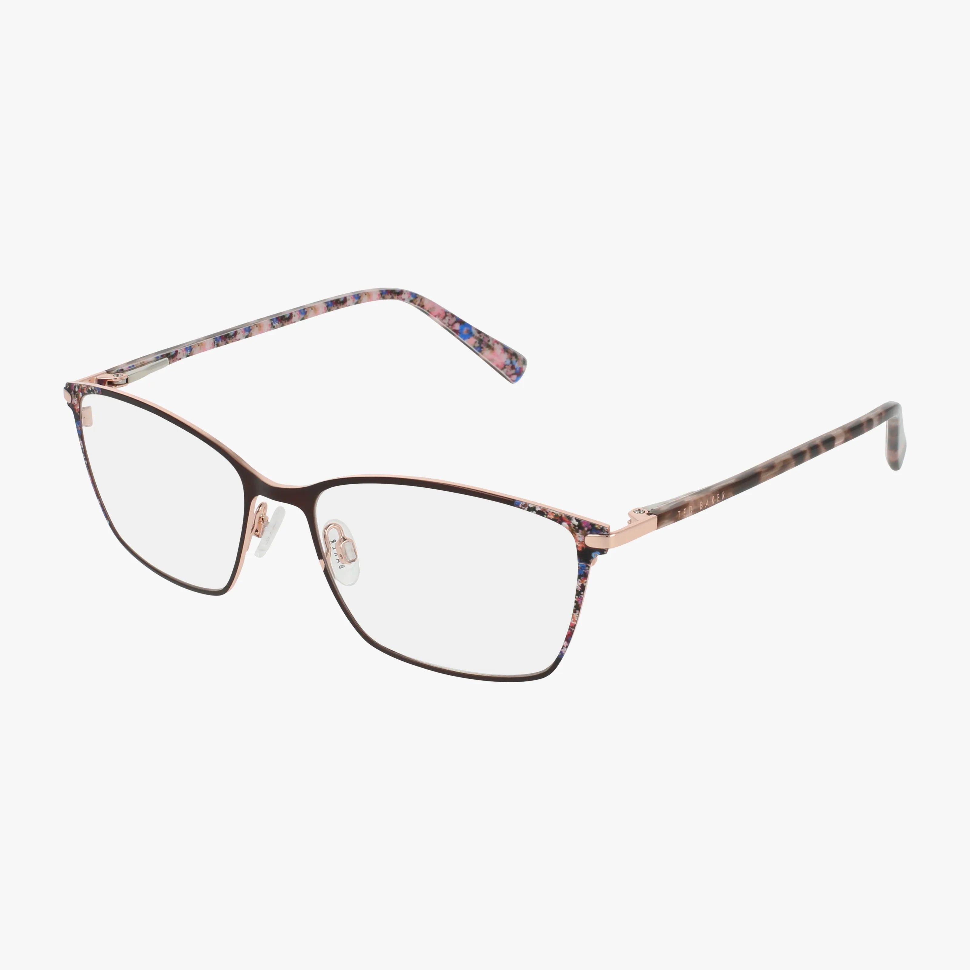 The TW527 rectangular eyeglasses feature thin rose gold metal frames and multicolored patterned temples for a modern look. Displayed on a white background, these stylish glasses can be fitted with prescription lenses.