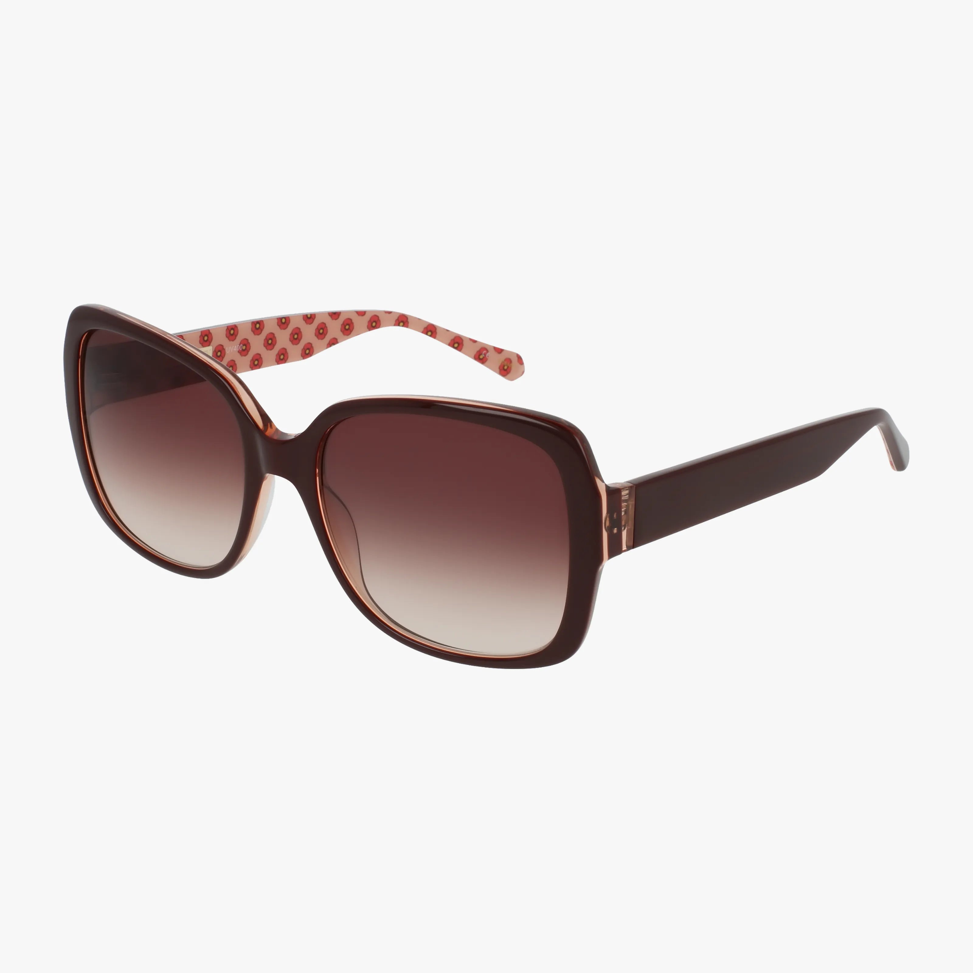 The ANI sunglasses feature an oversized brown frame with gradient lenses. The arms are dark brown outside, pink inside, and adorned with a pattern of small red and white circles. Displayed on a plain white background.