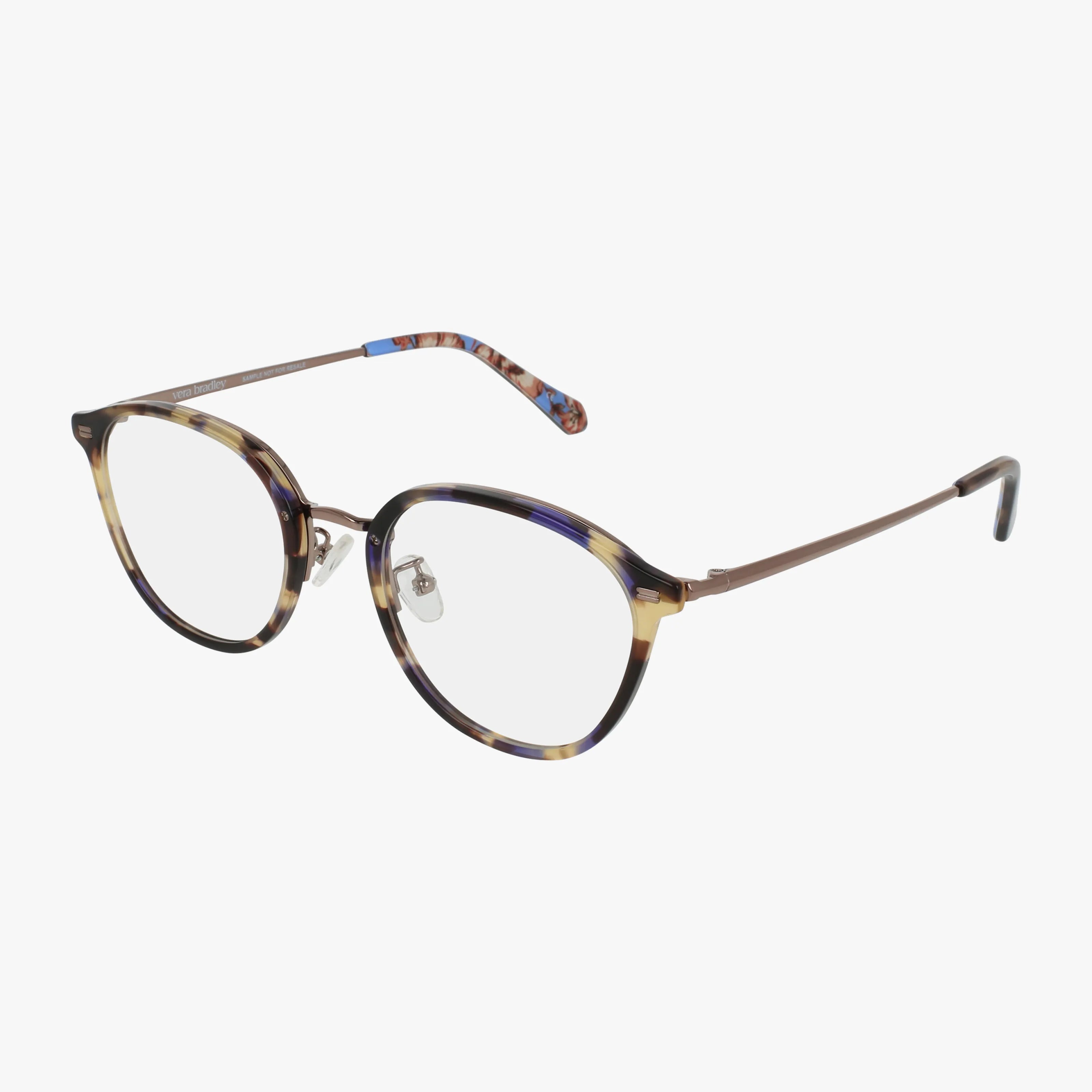 KLEO round eyeglasses feature brown and beige tortoiseshell frames, metal arms, clear lenses, and adjustable nose pads, shown on a white background.
